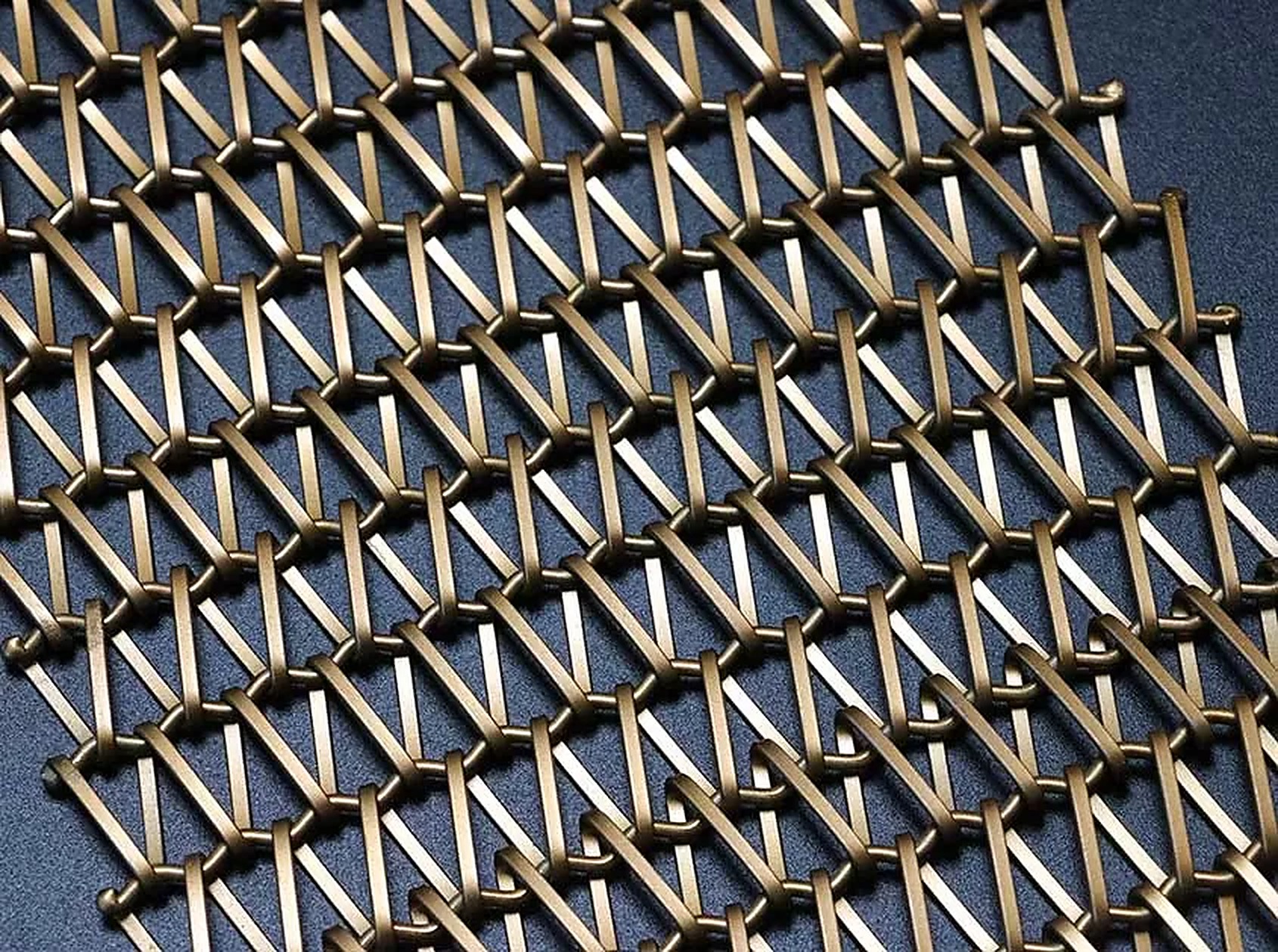 Close-up of spiral mesh in a bronze finish