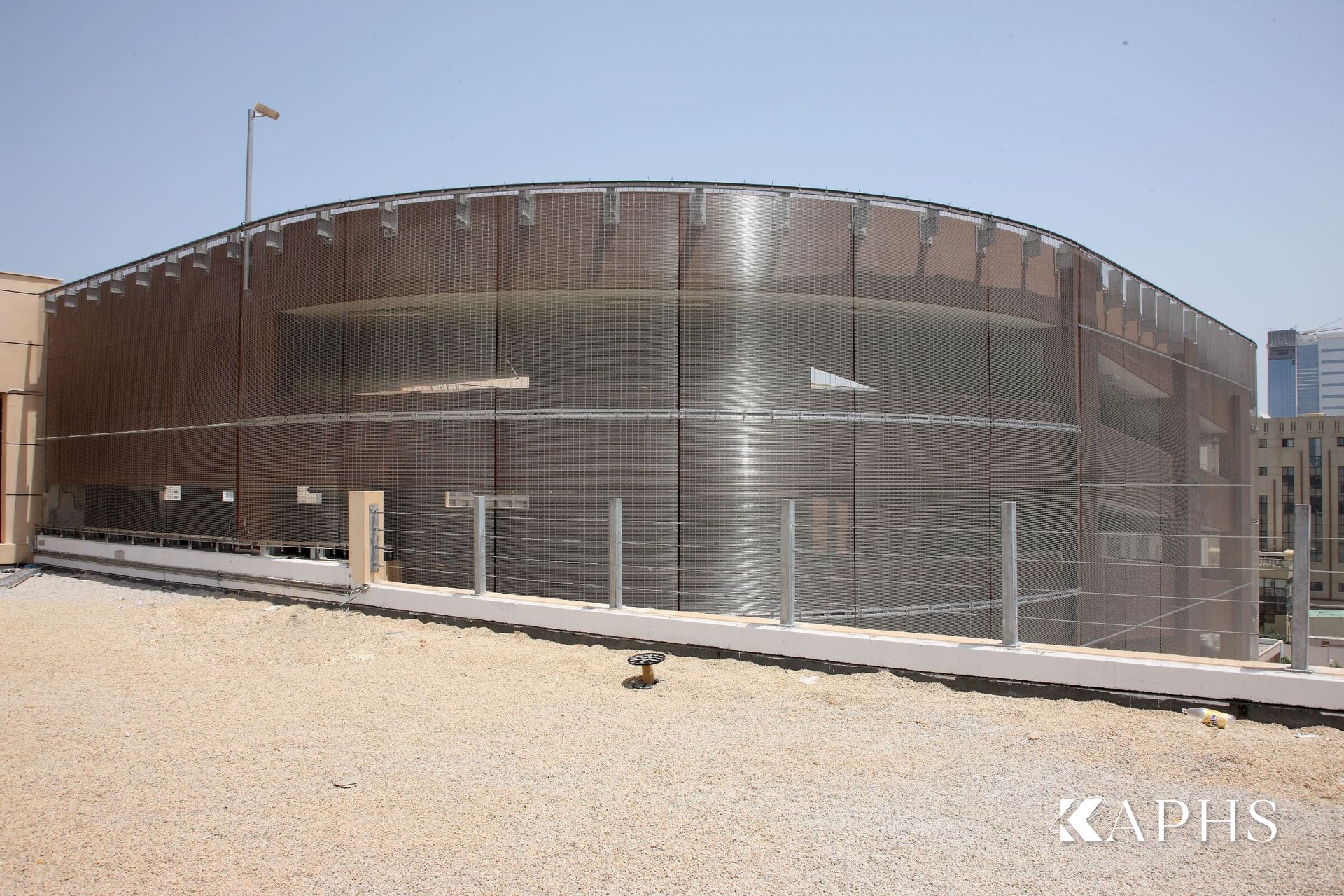 Wide view of the Al Naeem Mall car park clad in stainless woven wire mesh, Ras Al Khaimah — KAPHS