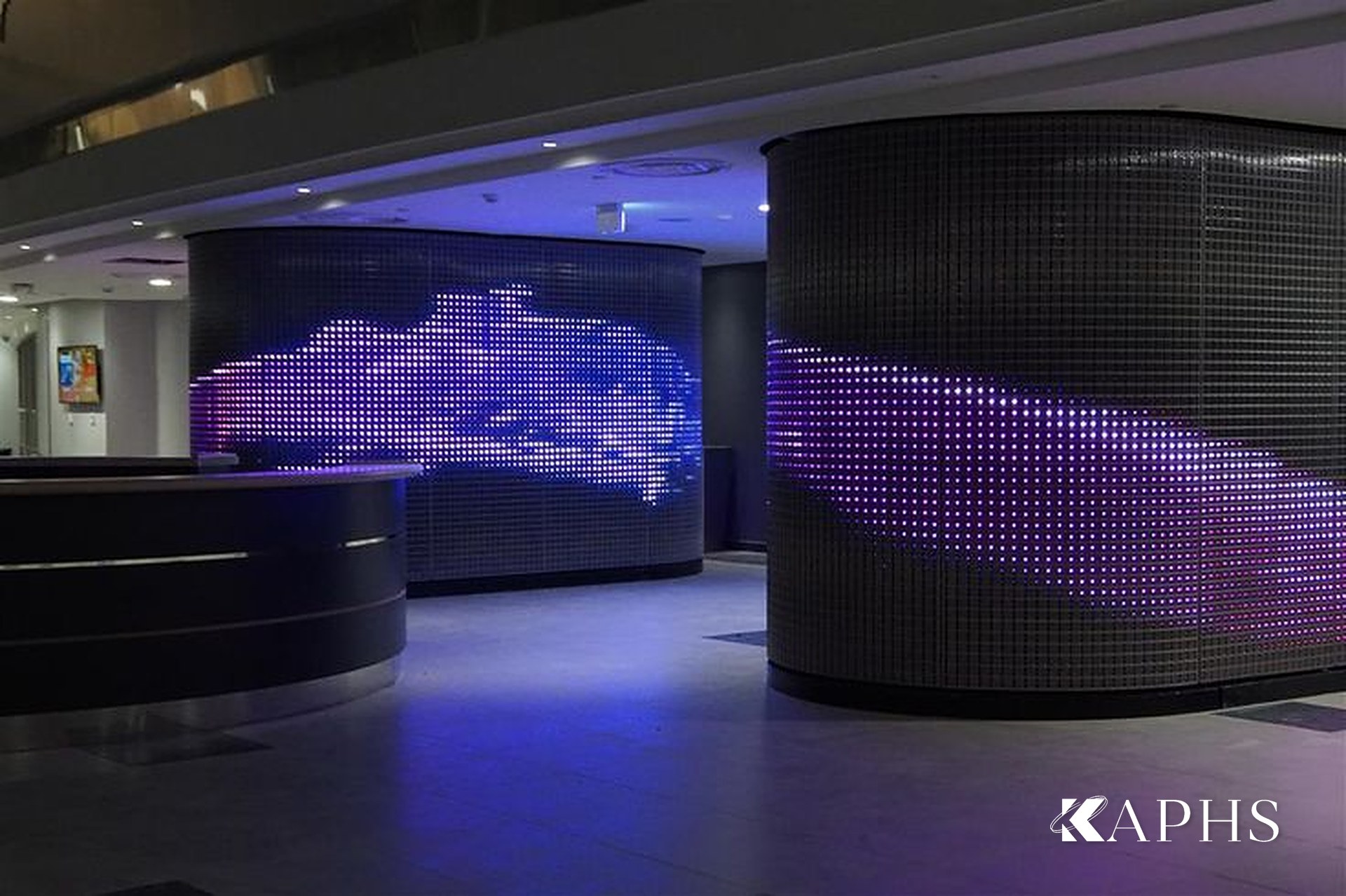 IMAGIC WEAVE LED media-façade mesh columns in the Al Sadd Sports Club lobby, Doha — KAPHS