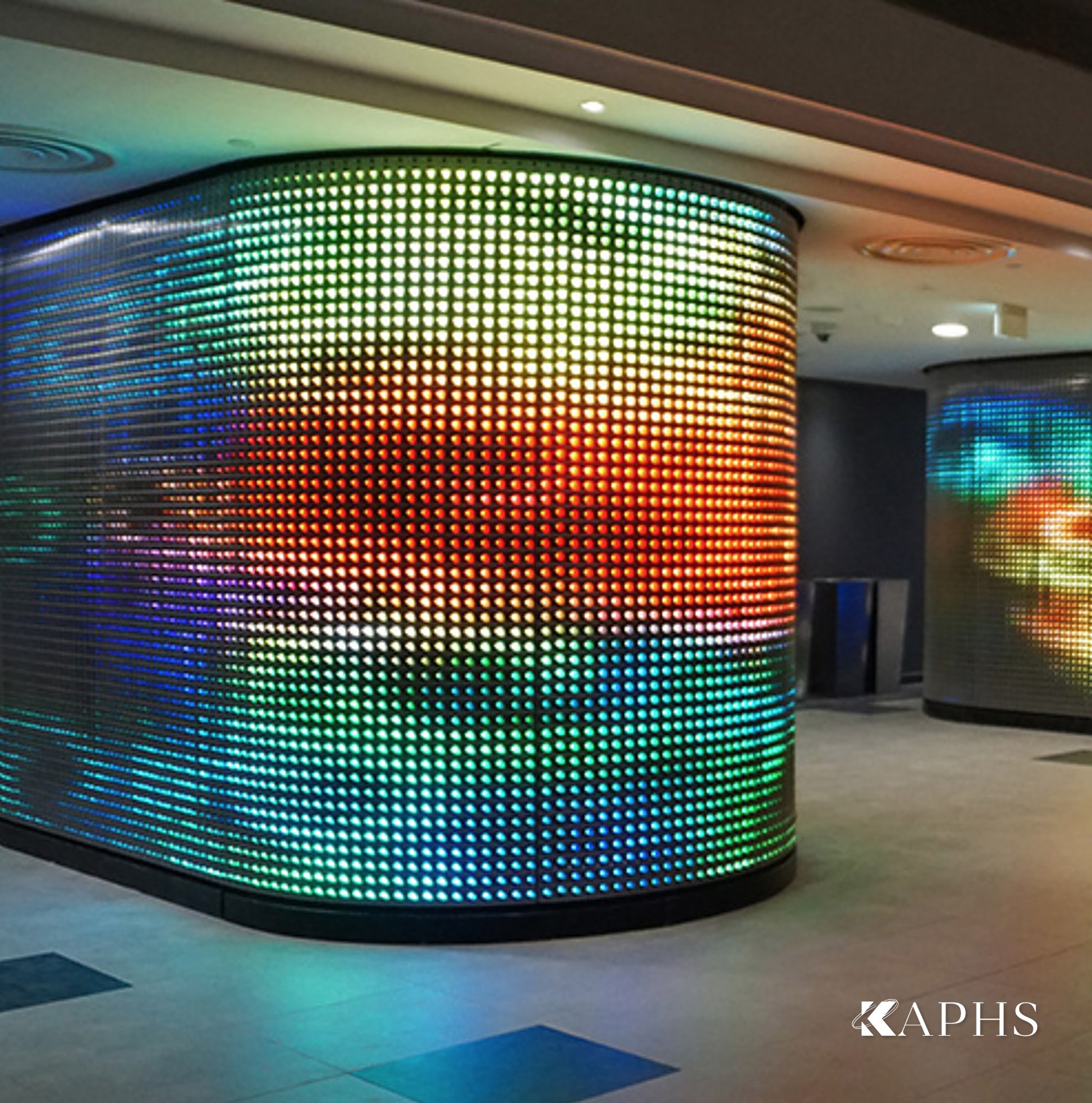 Colourful IMAGIC WEAVE LED media mesh feature column, Al Sadd Sports Club Doha — KAPHS