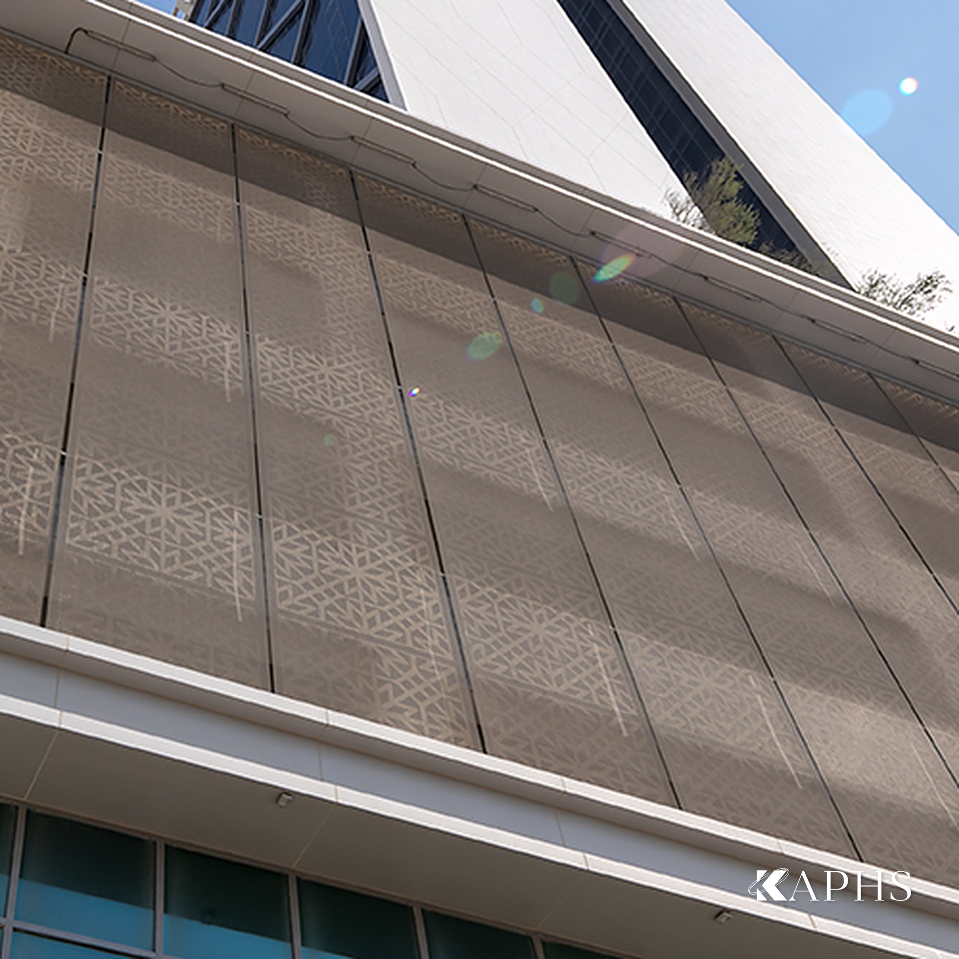 Detail of the ornamental EGLA-MONO painted architectural wire mesh on the Al Sendian Tower podium, Qatar — KAPHS