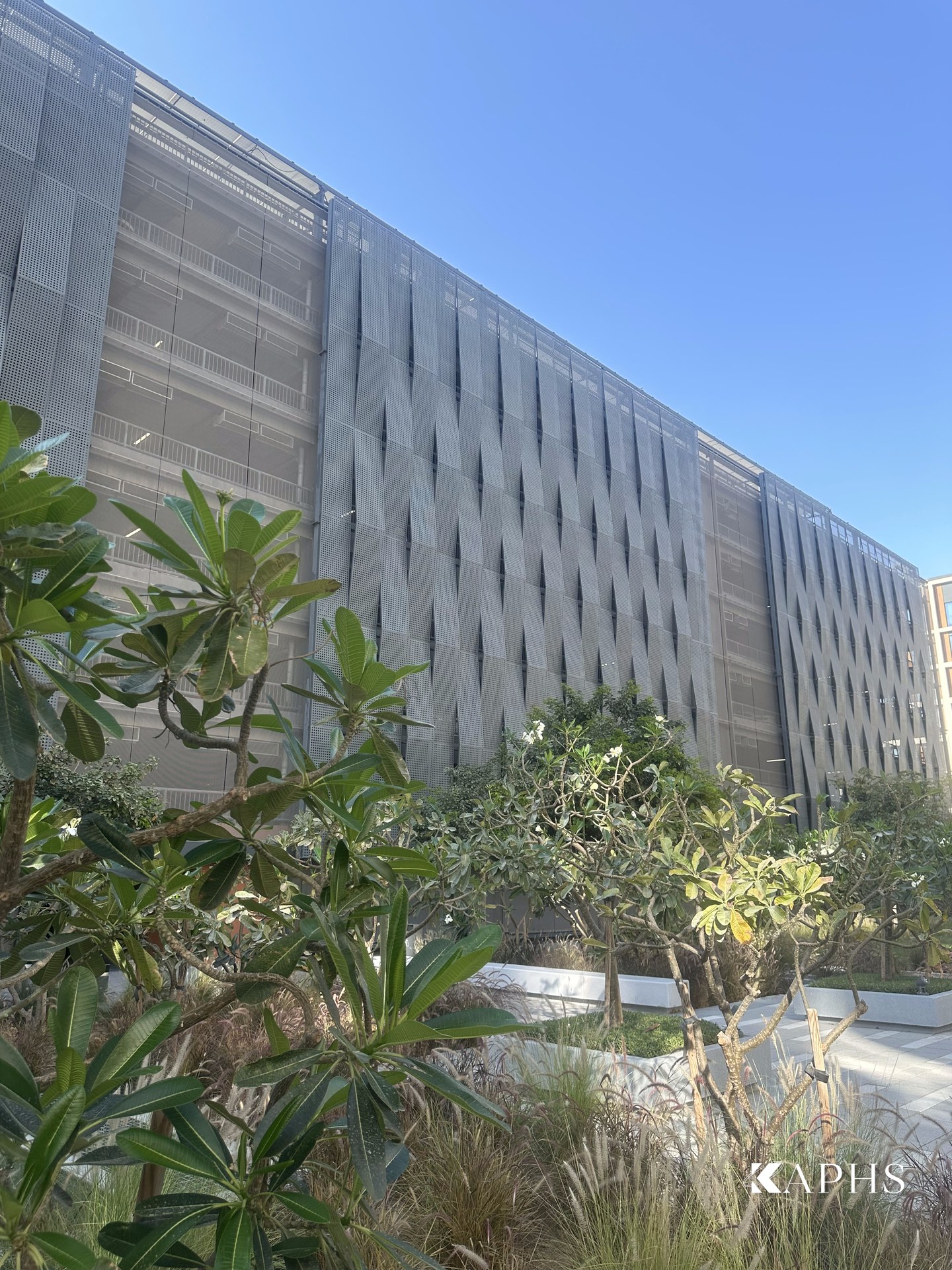 Multi-storey car park screened by EGLA-TWIN stainless architectural wire mesh, Dubai Hills — KAPHS