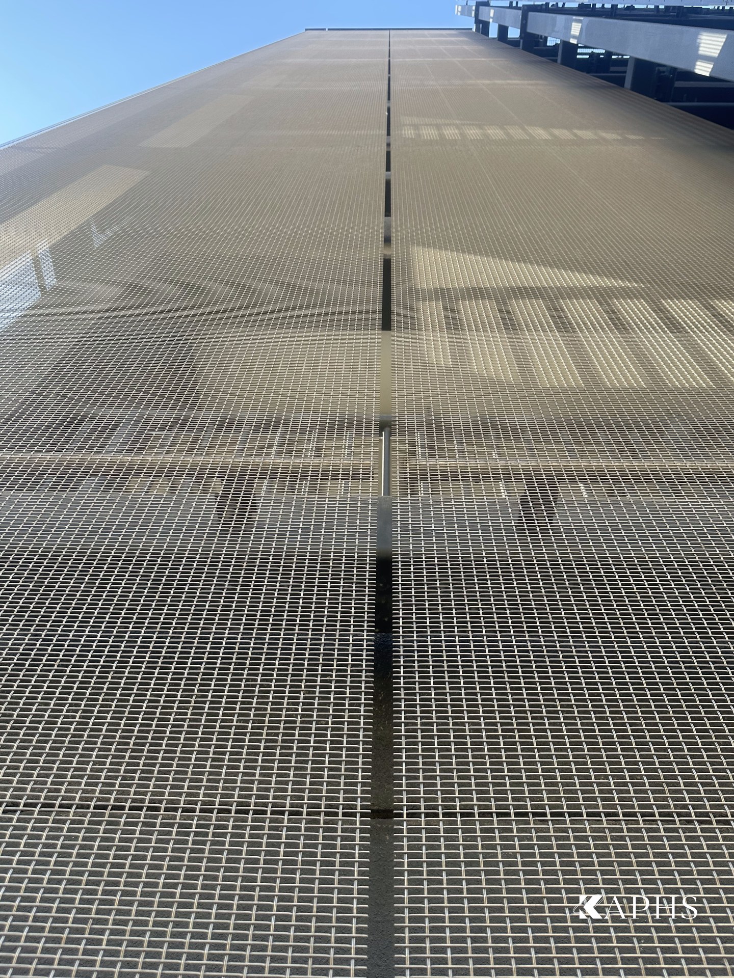 Light-reflective EGLA-TWIN stainless architectural wire mesh cladding, Dubai Hills car park — KAPHS
