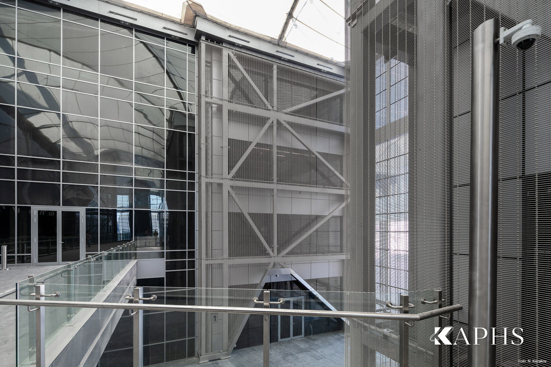 Curved Haver & Boecker architectural wire mesh screen in the Energy City atrium, Qatar — KAPHS