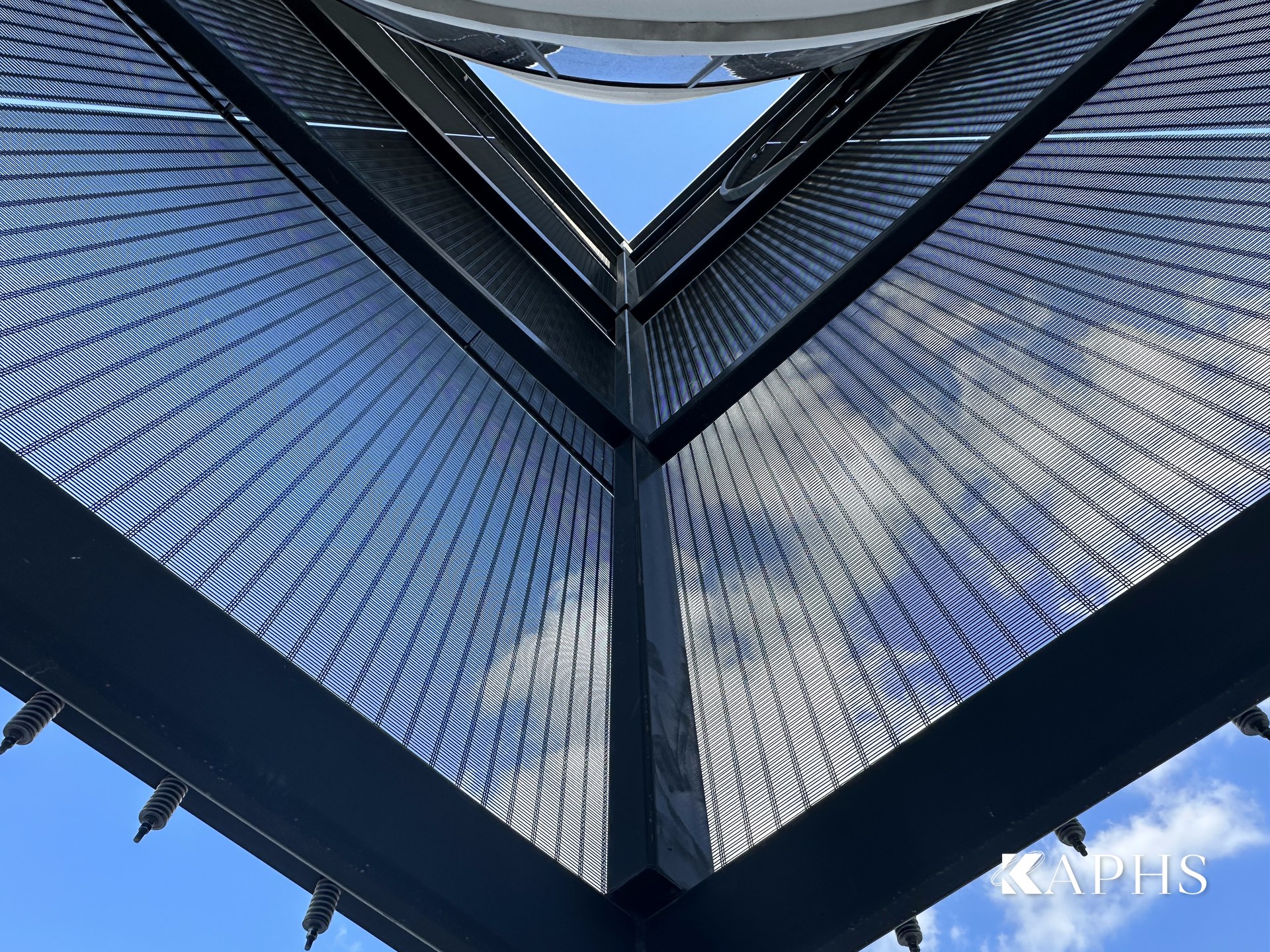 Looking up the DOGLIA-TRIO architectural wire mesh façade at the Mercedes-Benz d3 showroom, Dubai — KAPHS