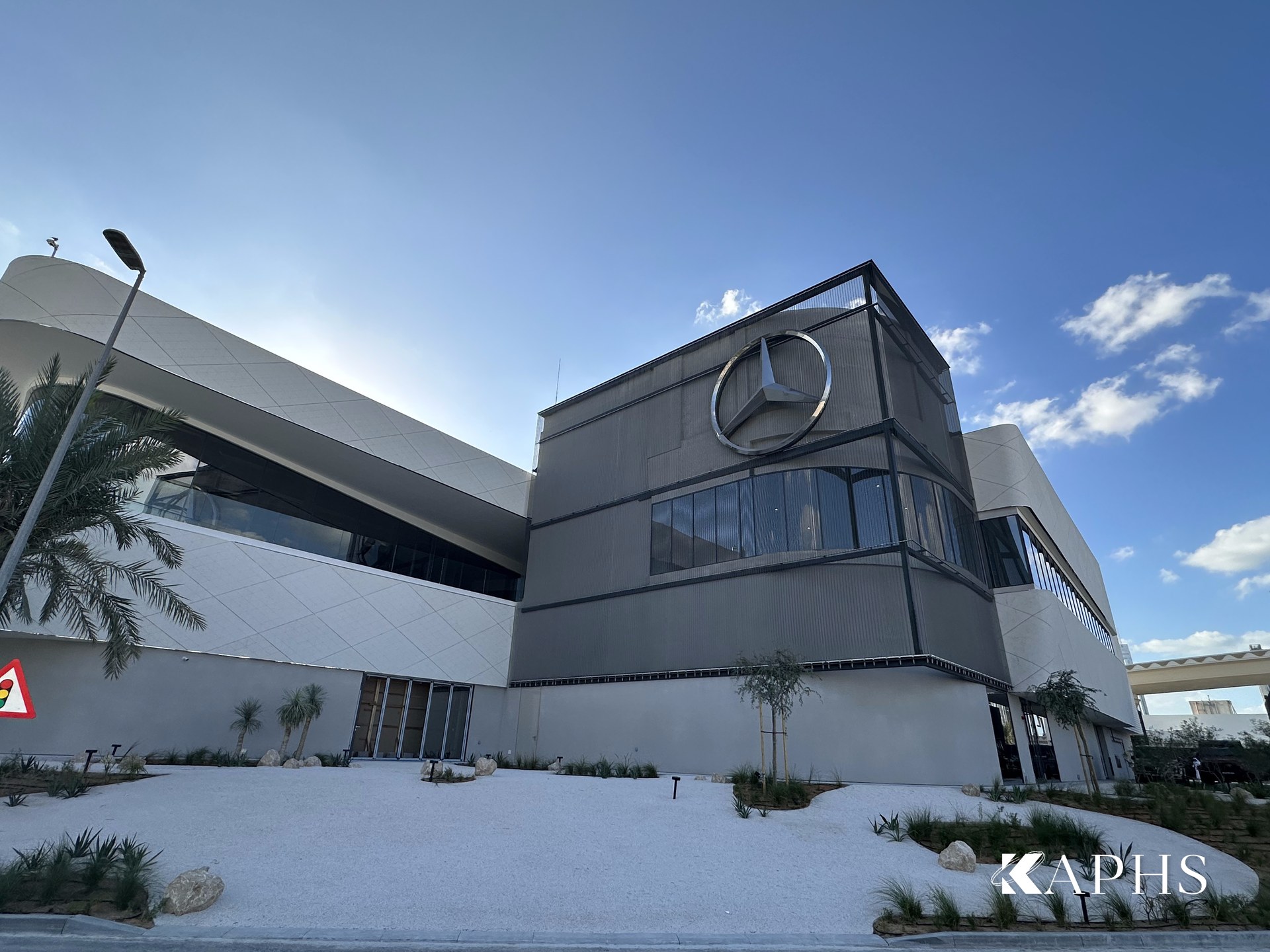 Mercedes-Benz flagship showroom exterior clad in architectural wire mesh, Dubai Design District — KAPHS