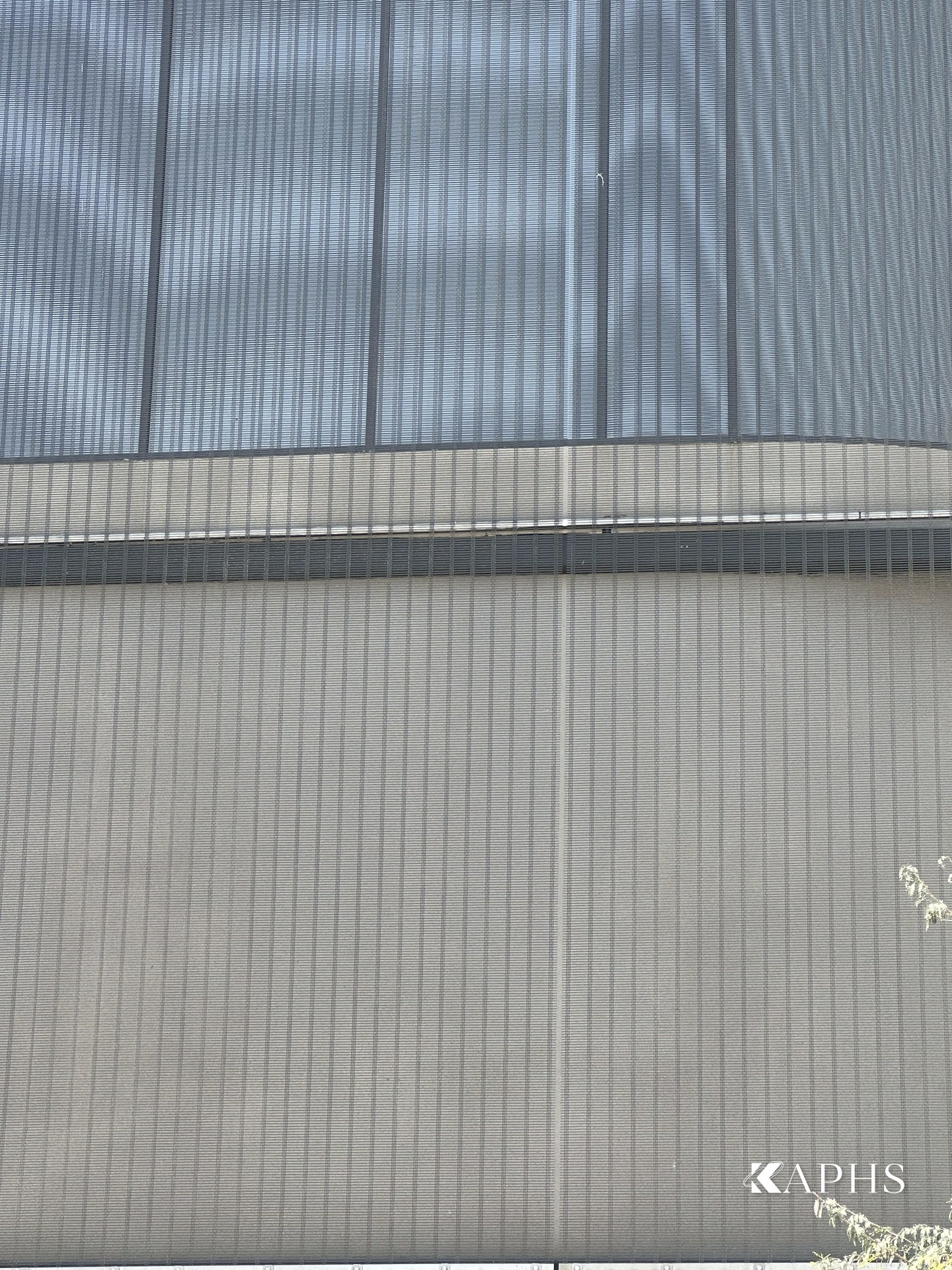 Curved architectural wire mesh façade edge, Mercedes-Benz flagship showroom Dubai — KAPHS