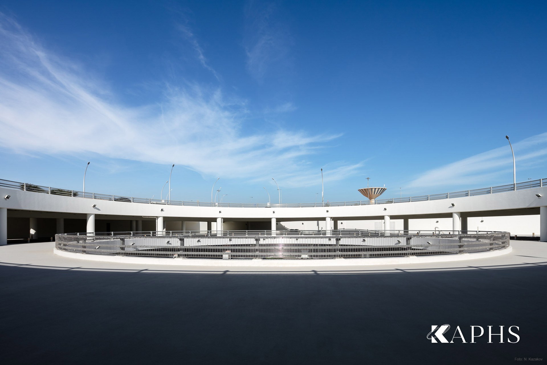 Wide view of the North East Car Park ramp with DOKA-BARRETTE architectural wire mesh screening, Doha — KAPHS