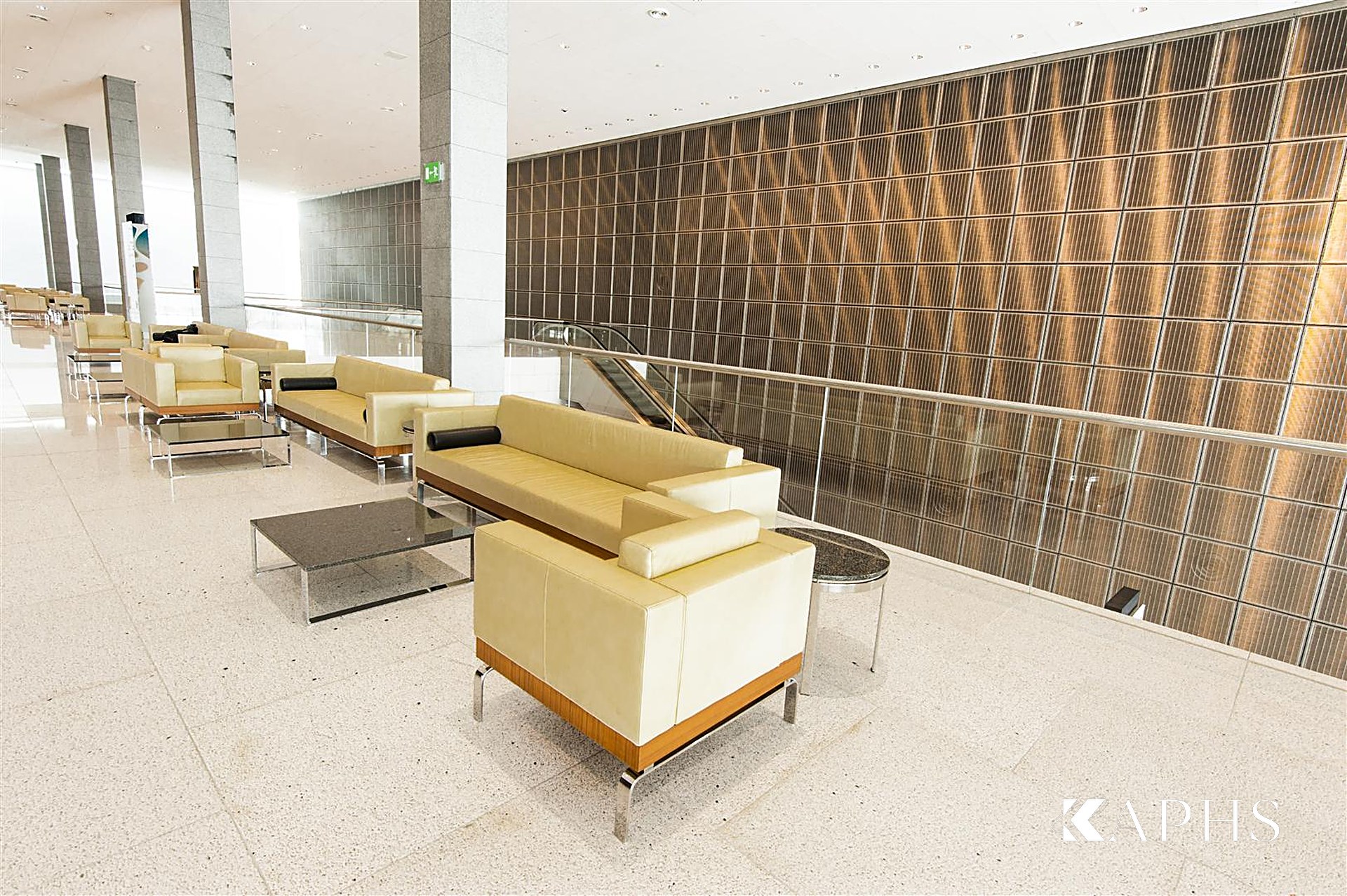 Bronze architectural wire mesh wall in the QNCC foyer, Doha — KAPHS