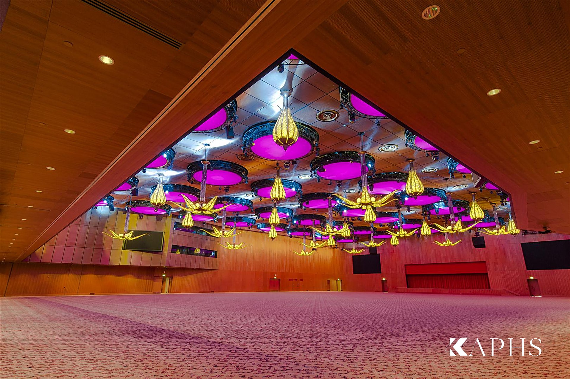 Qatar National Convention Centre ballroom with bronze wire mesh detailing, Doha — KAPHS