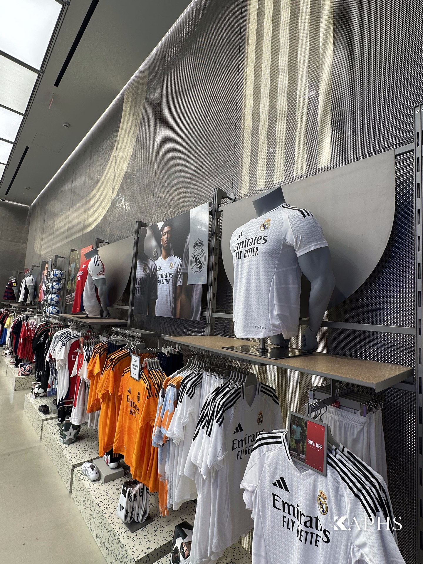 DWM Mosa decorative wire mesh wall cladding behind the merchandising, Adidas Young Athletes Dubai Mall — KAPHS