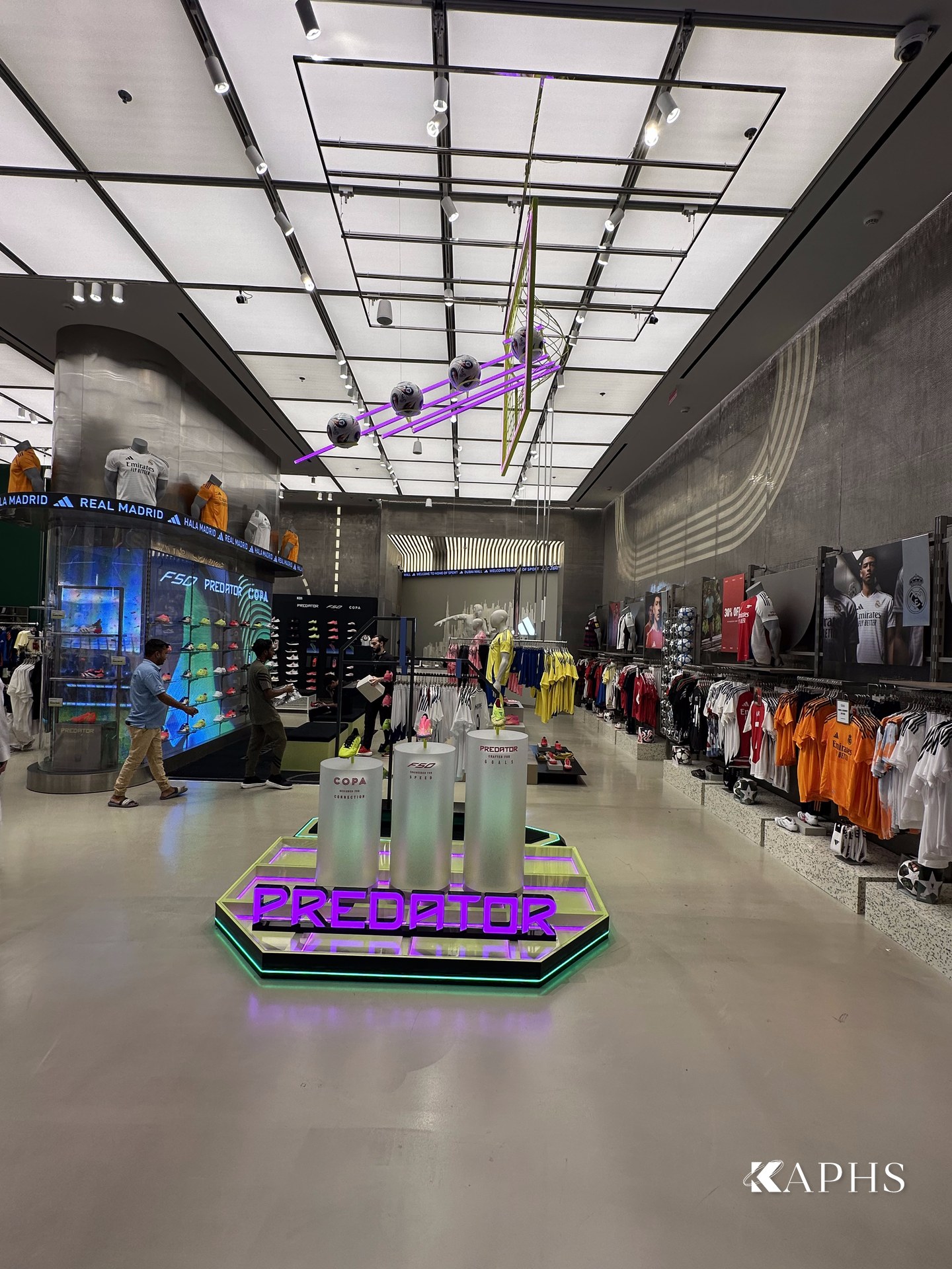 Store interior with DWM Mosa decorative wire mesh cladding, Adidas Young Athletes Dubai Mall — KAPHS