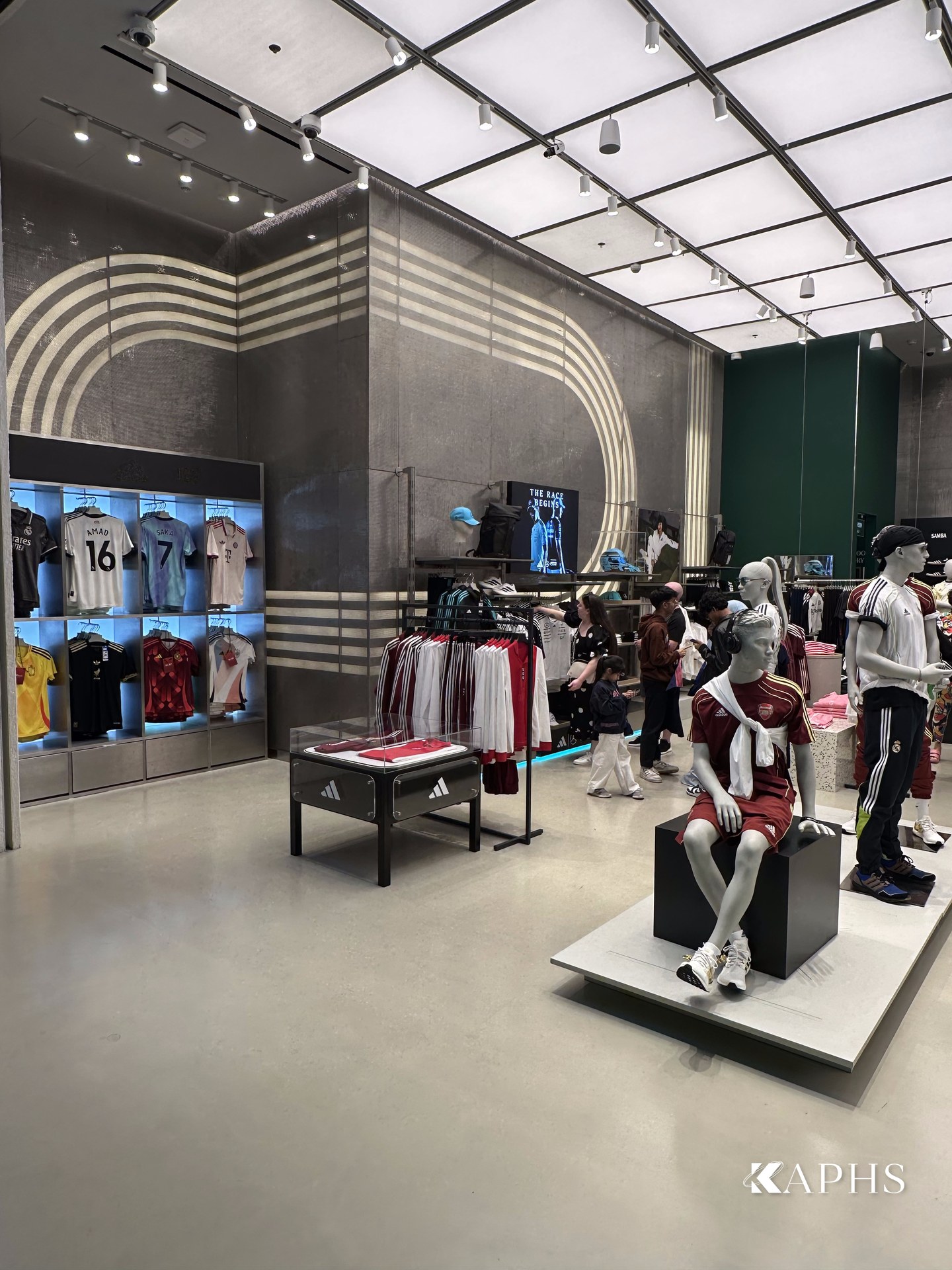 DWM Mosa decorative wire mesh wall cladding along the retail floor, Adidas Young Athletes Dubai Mall — KAPHS