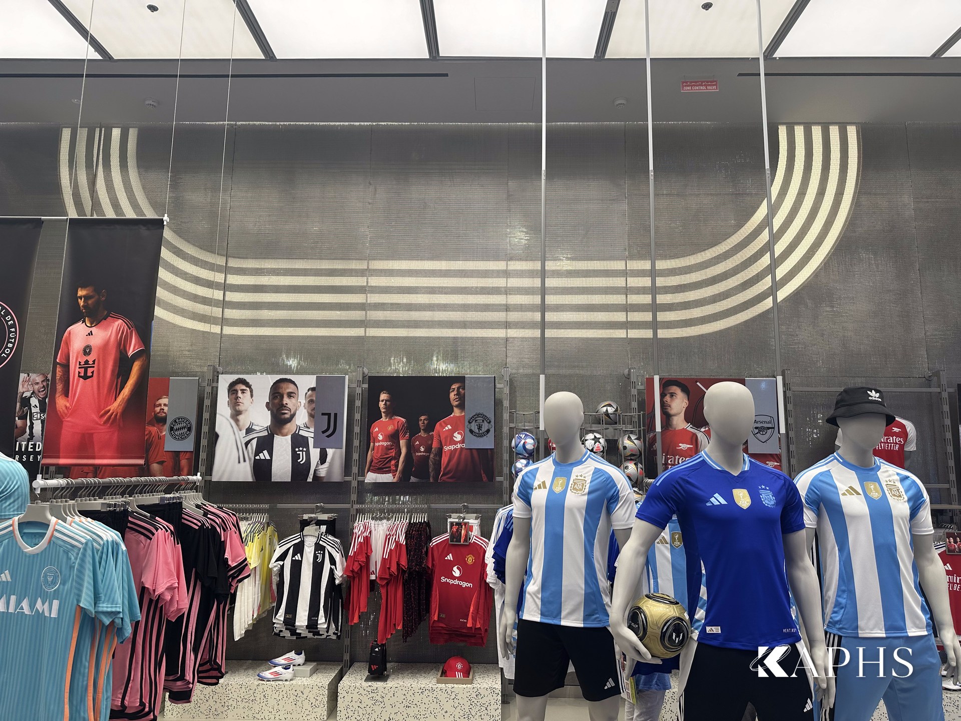 Adidas Young Athletes store display against DWM Mosa decorative wire mesh, Dubai Mall — KAPHS
