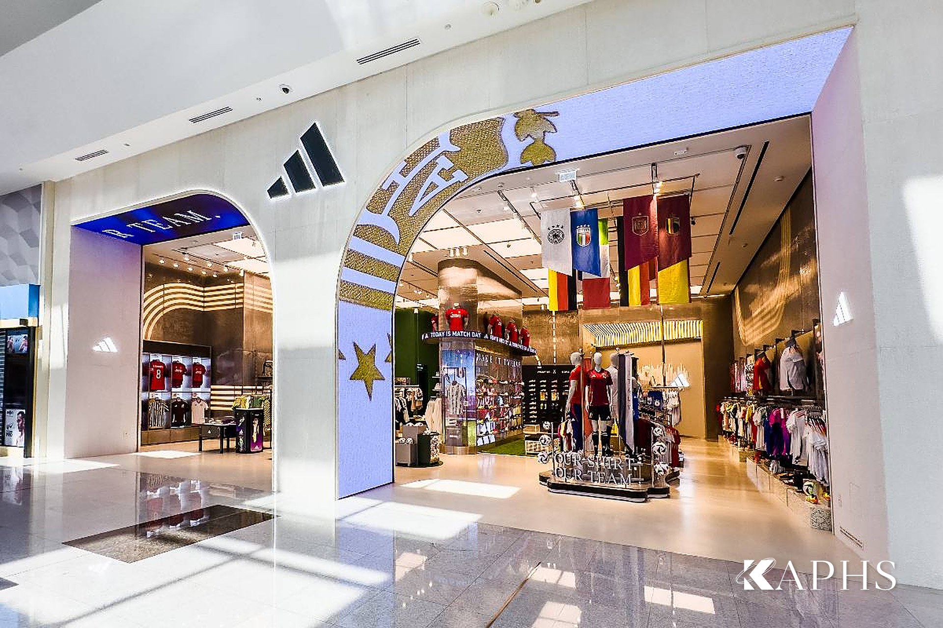 Adidas Young Athletes storefront at Dubai Mall with DWM Mosa decorative wire mesh feature arch — KAPHS