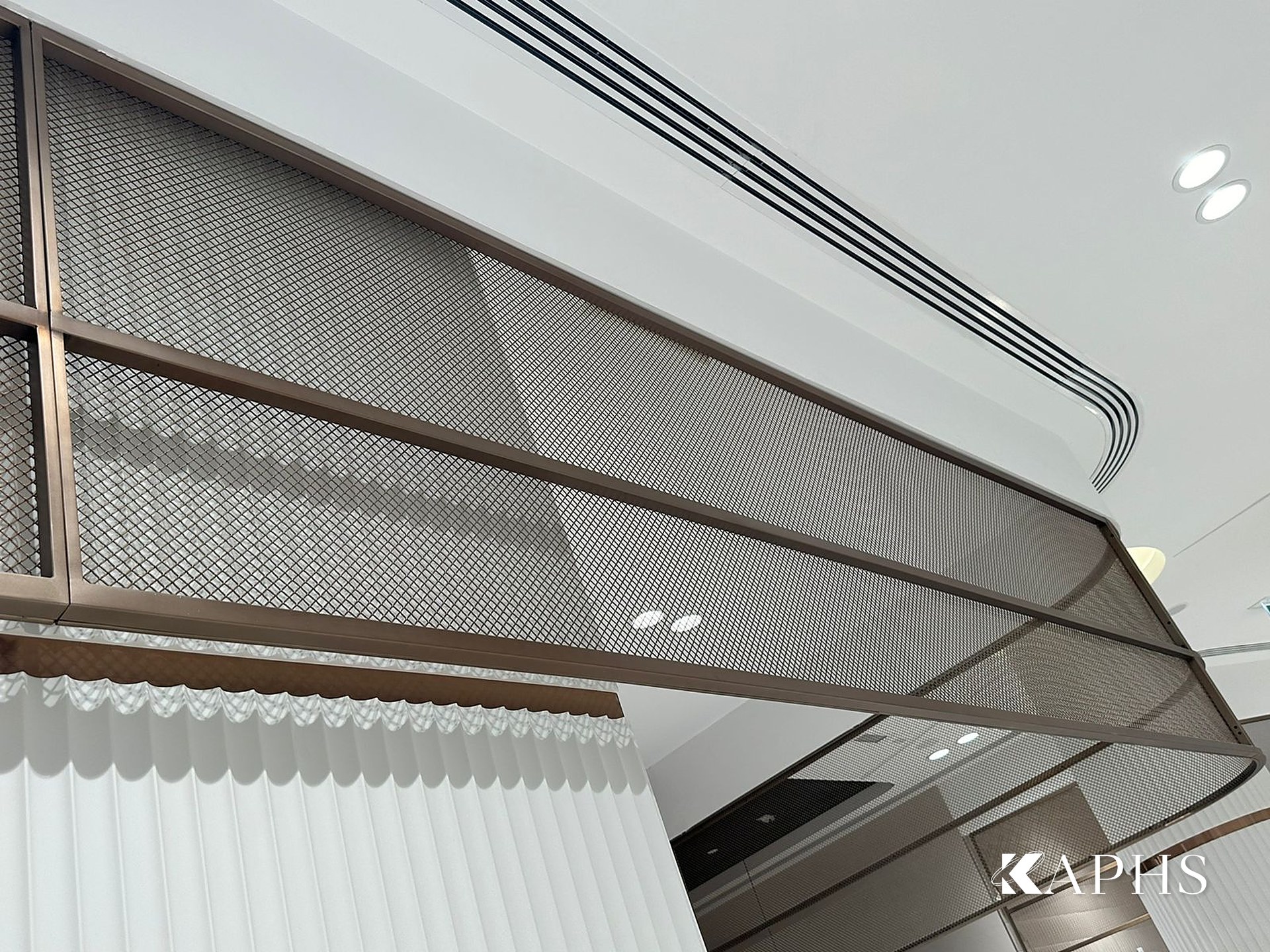 Angled bronze decorative wire mesh feature panels, DAFZA Food Court Dubai — KAPHS