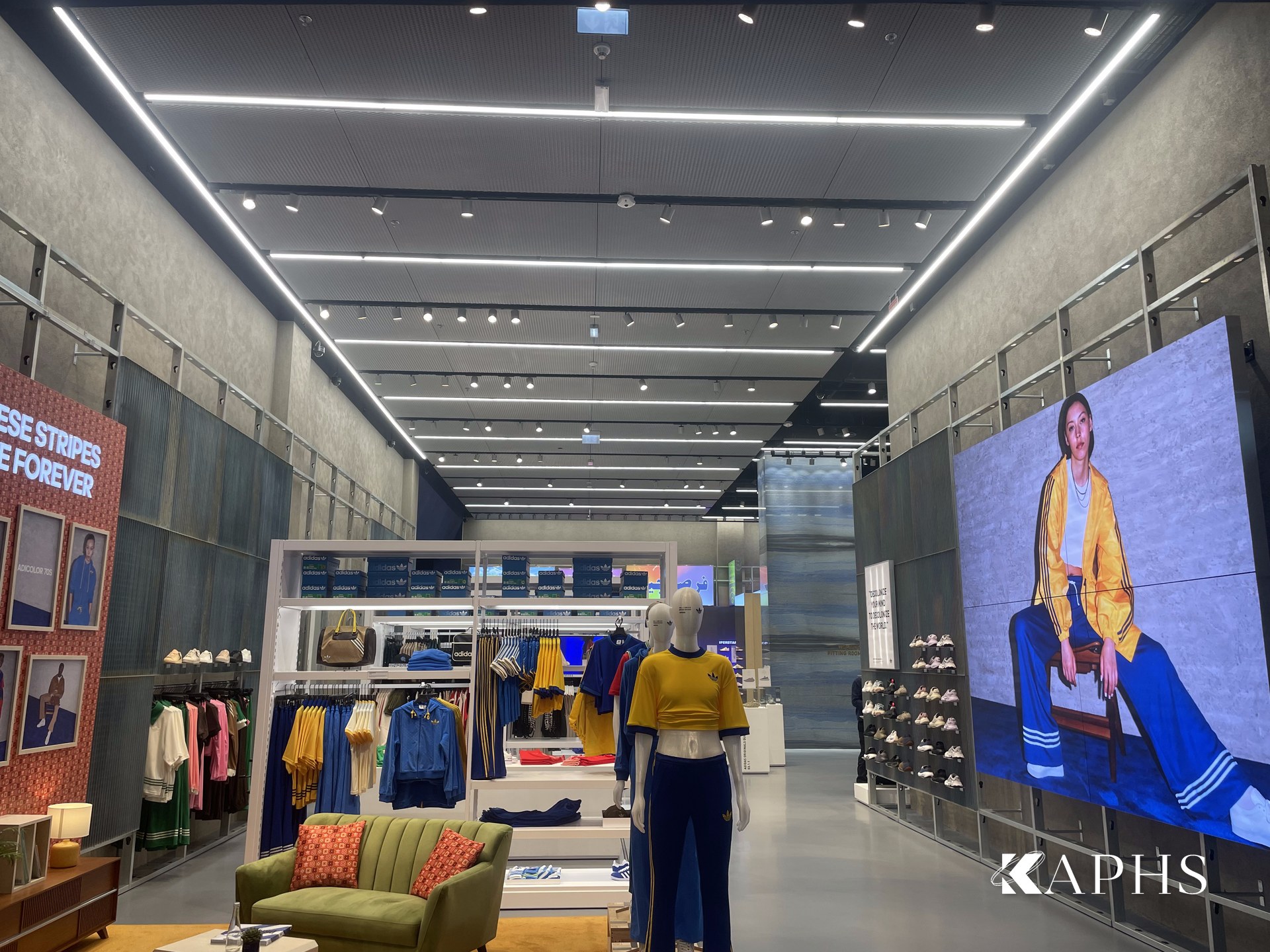 Retail interior beneath the ExpandForm expanded metal mesh ceiling, Adidas Originals Dubai Mall — KAPHS