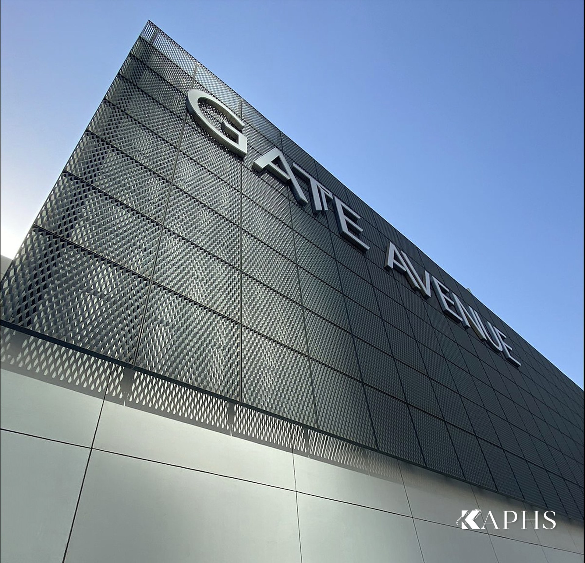 Angled view of the ExpandForm expanded metal mesh façade at DIFC Gate Avenue, Dubai — KAPHS