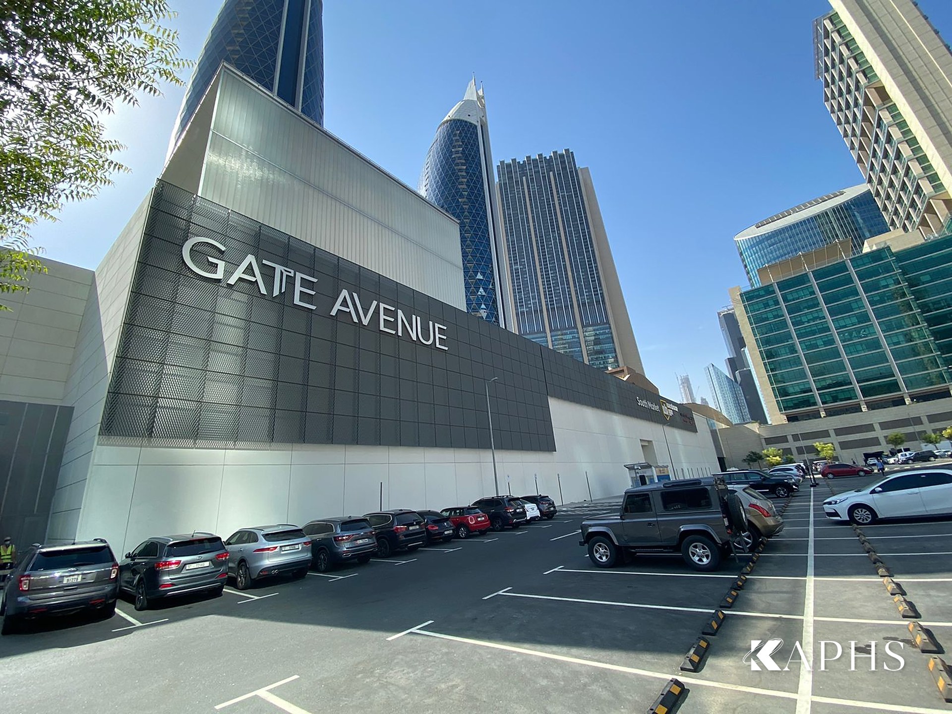 ExpandForm expanded metal mesh car-park cladding beside the DIFC towers, Dubai — KAPHS