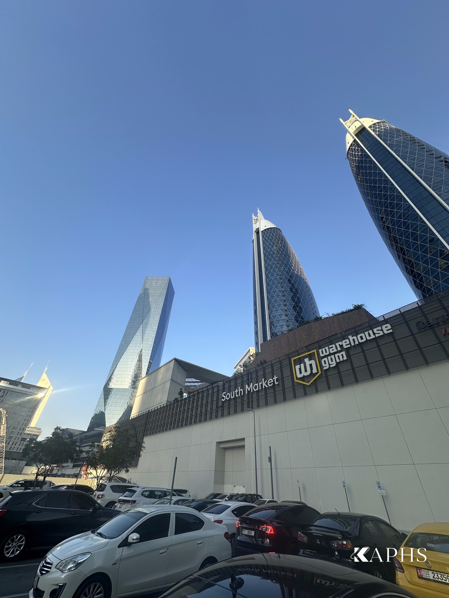 DIFC Gate Avenue expanded metal mesh cladding with Dubai towers behind — KAPHS