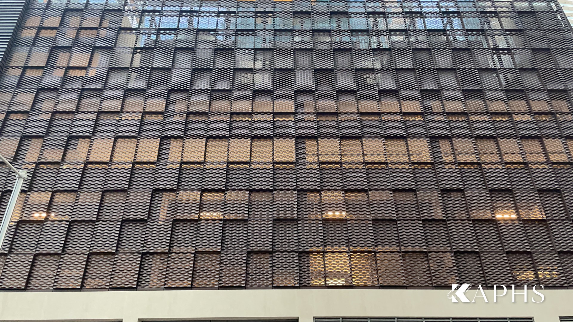 Light and shadow across the ExpandForm expanded metal mesh façade, Marina Gate Tower 3 Dubai — KAPHS