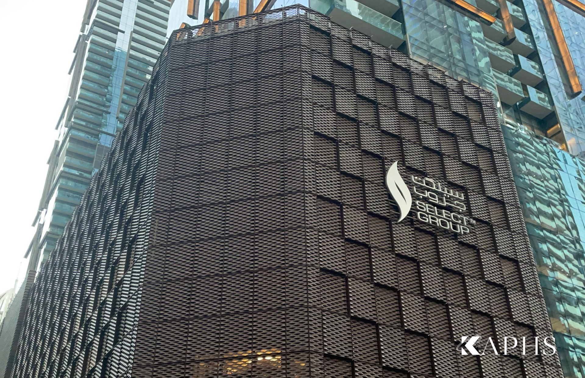Select Group signage on the ExpandForm expanded metal mesh car-park façade, Marina Gate Tower 3 — KAPHS