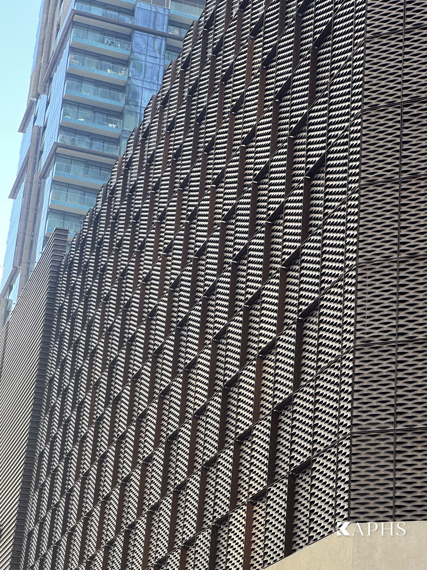 ExpandForm 400mm round-pattern expanded metal mesh cladding, Marina Gate Tower 3 Dubai — KAPHS