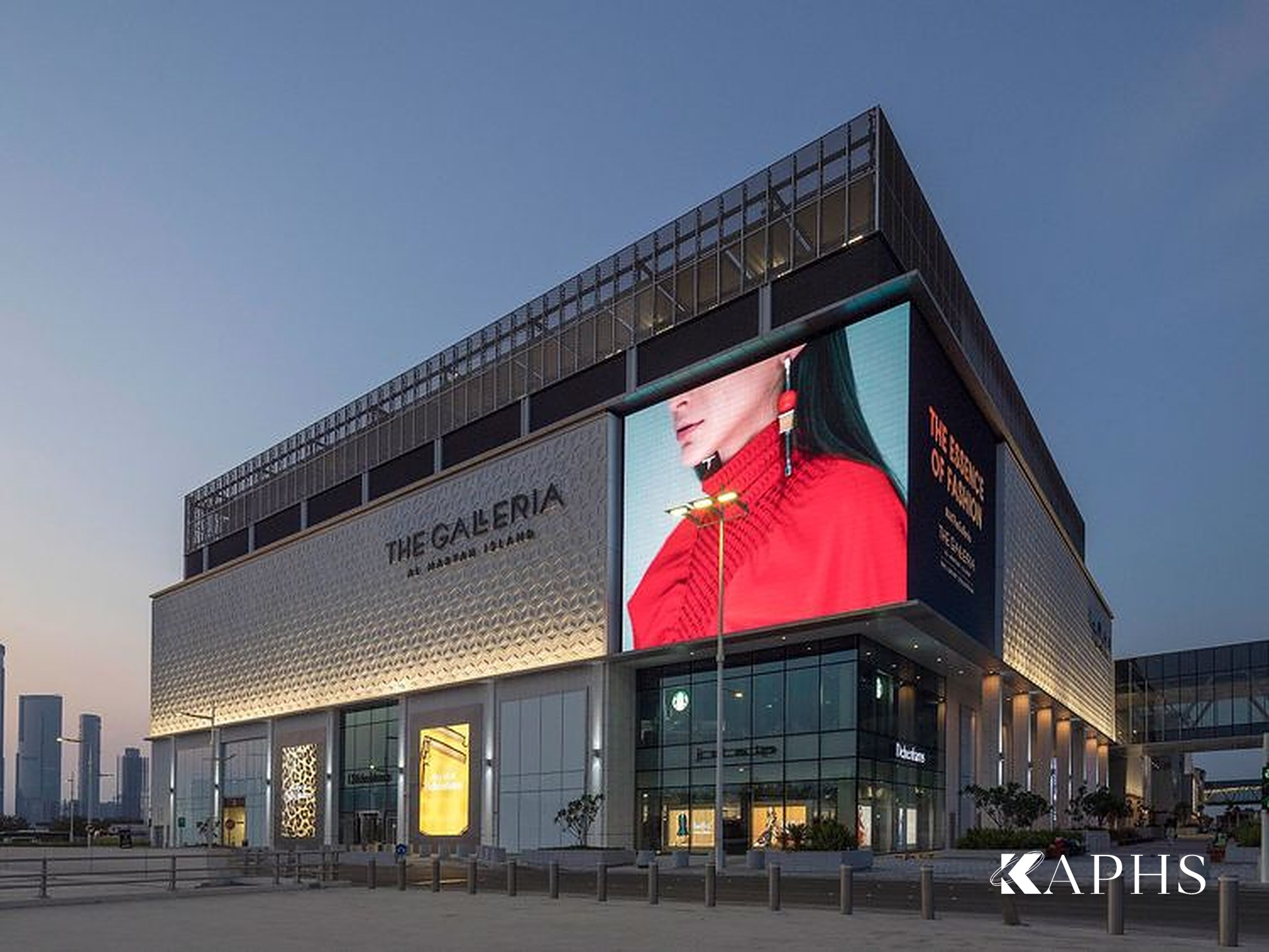 The Galleria Al Maryah Island façade with the ExpandForm expanded metal mesh rooftop screen, Abu Dhabi — KAPHS