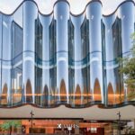 Curved jumbo glass wave façade by NorthGlass — KAPHS, Dubai & UAE
