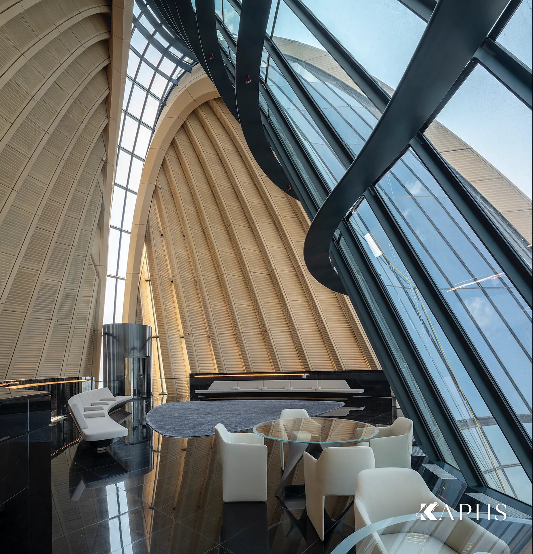 Curved NorthGlass jumbo glass and timber-lined interior at the NBK HQ, Kuwait City — KAPHS