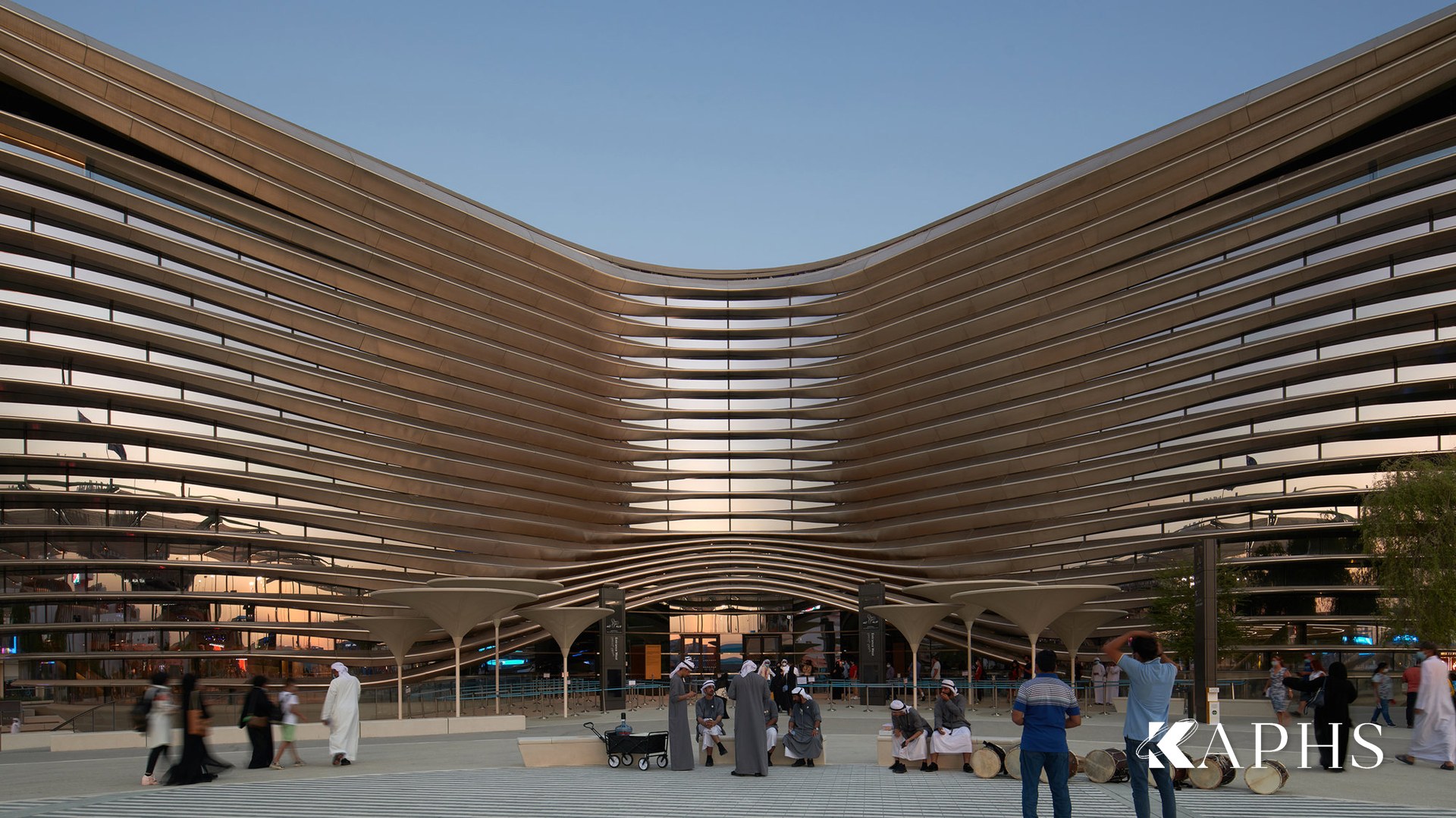 Curved NorthGlass jumbo glass façade of the Mobility Pavilion, Expo City Dubai — KAPHS