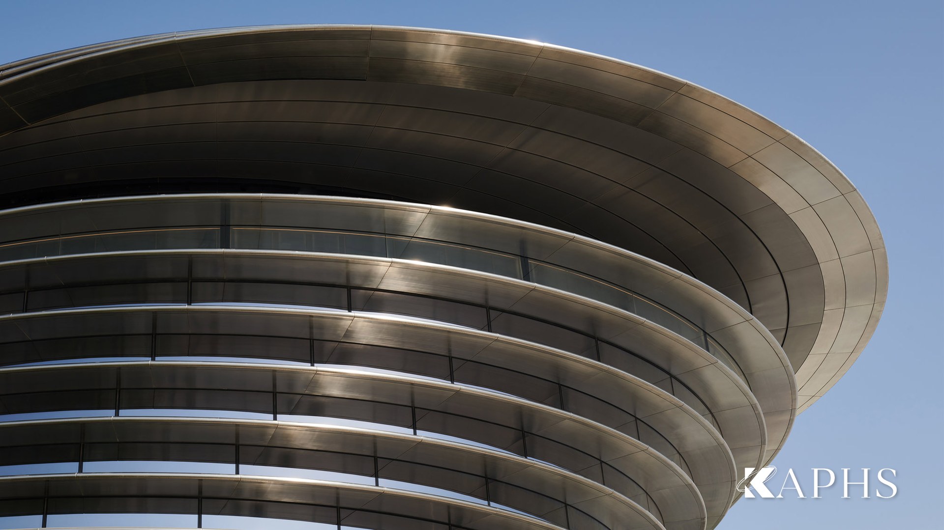 Curved NorthGlass jumbo glass and stainless cladding at the Mobility Pavilion, Dubai — KAPHS