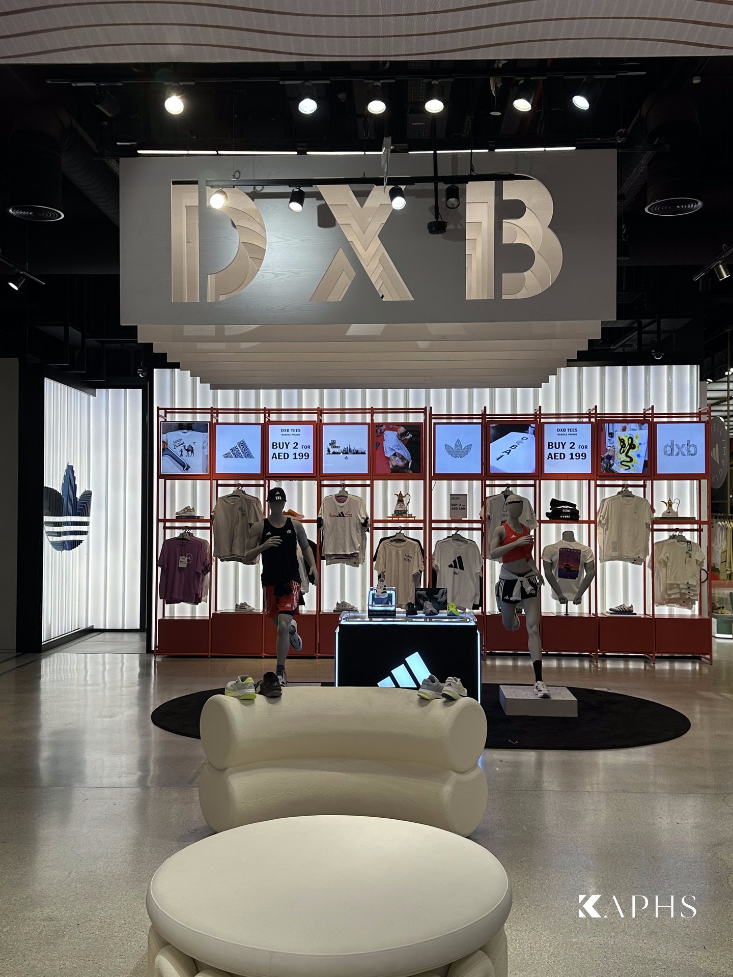 Backlit U-channel glass display wall, adidas Flagship Store Dubai Mall — KAPHS