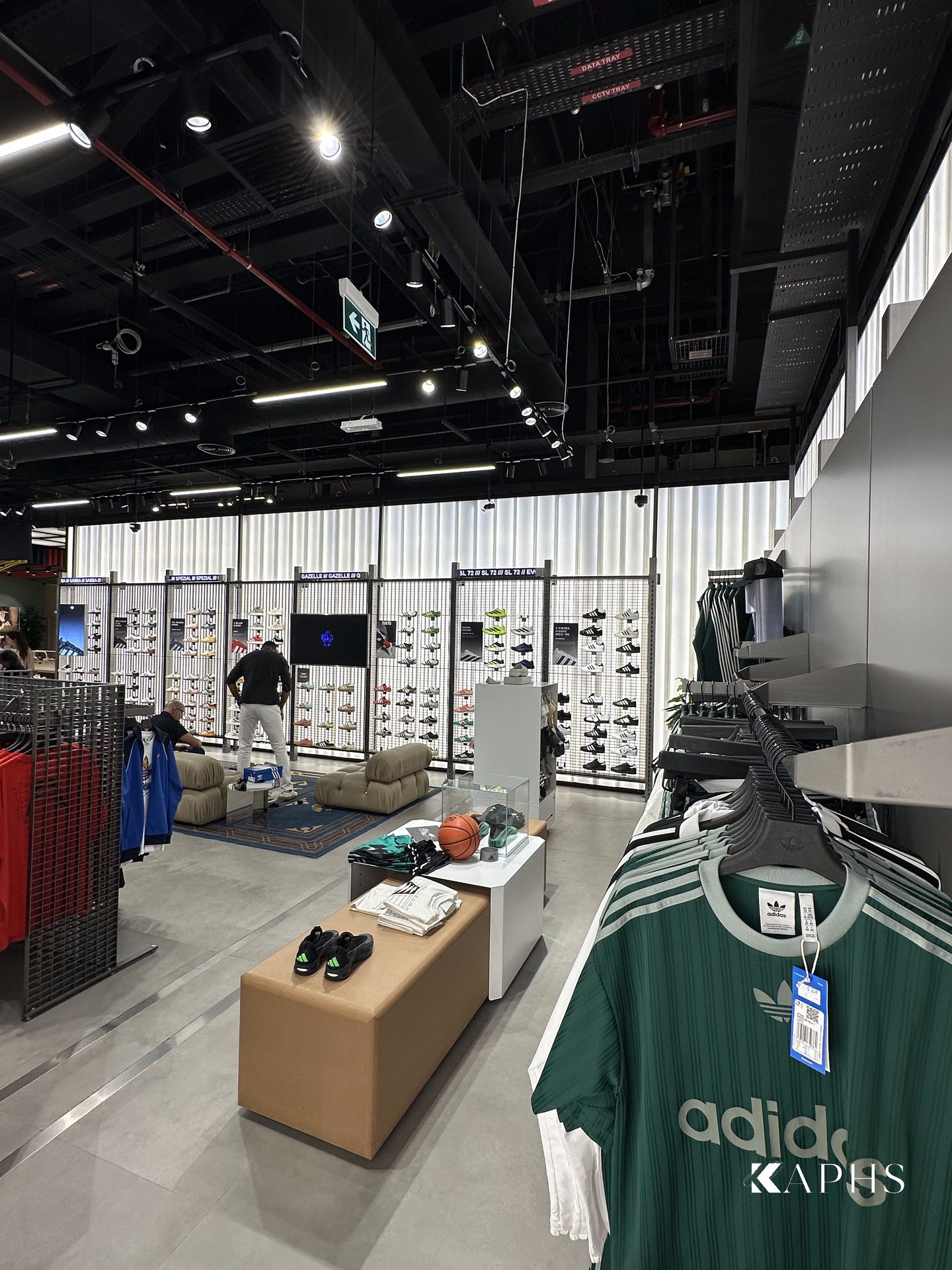 adidas Flagship Store Dubai Mall — backlit channel glass feature wall, KAPHS