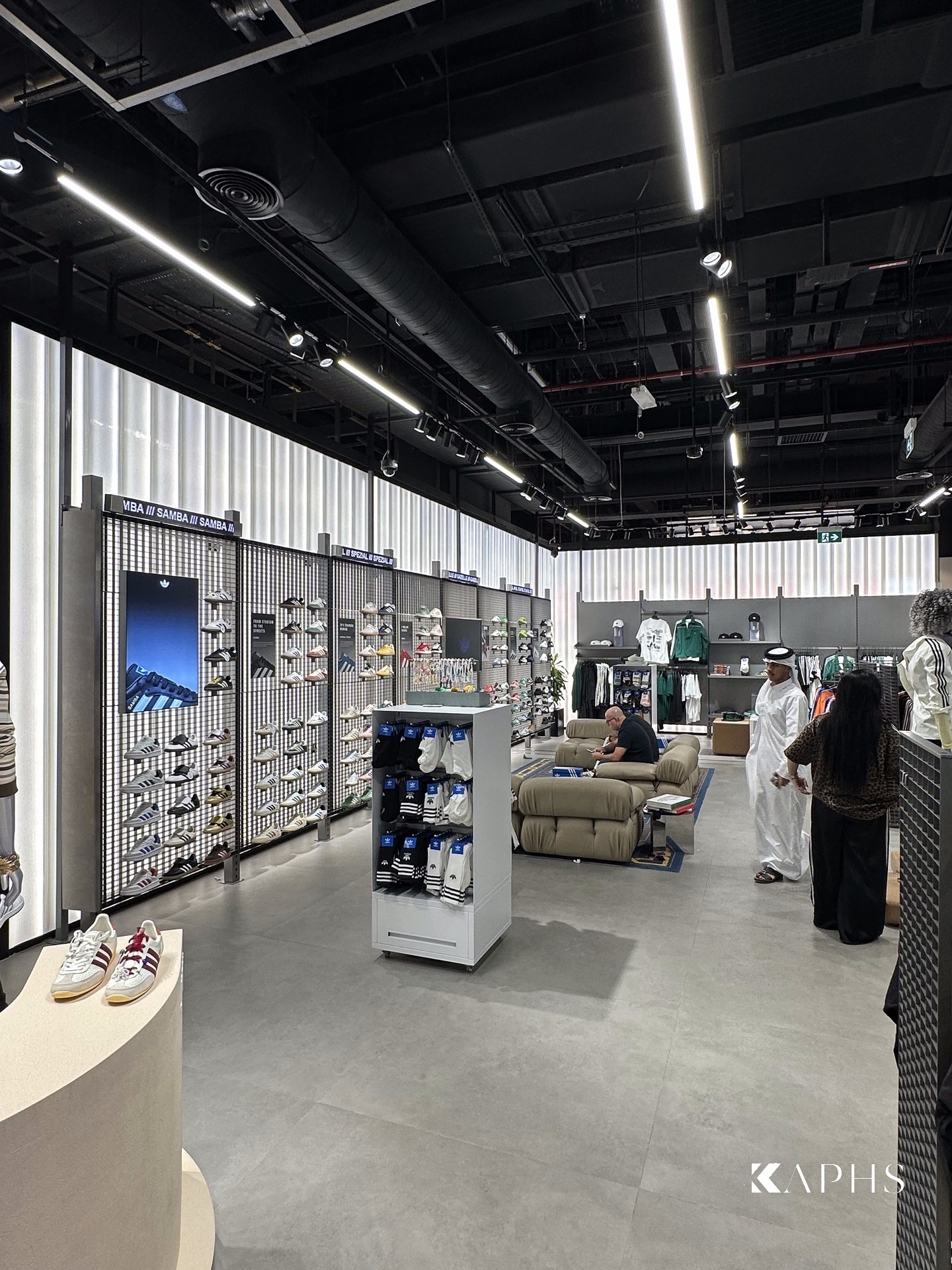 Translucent channel glass feature wall, adidas Flagship Store Dubai Mall — KAPHS