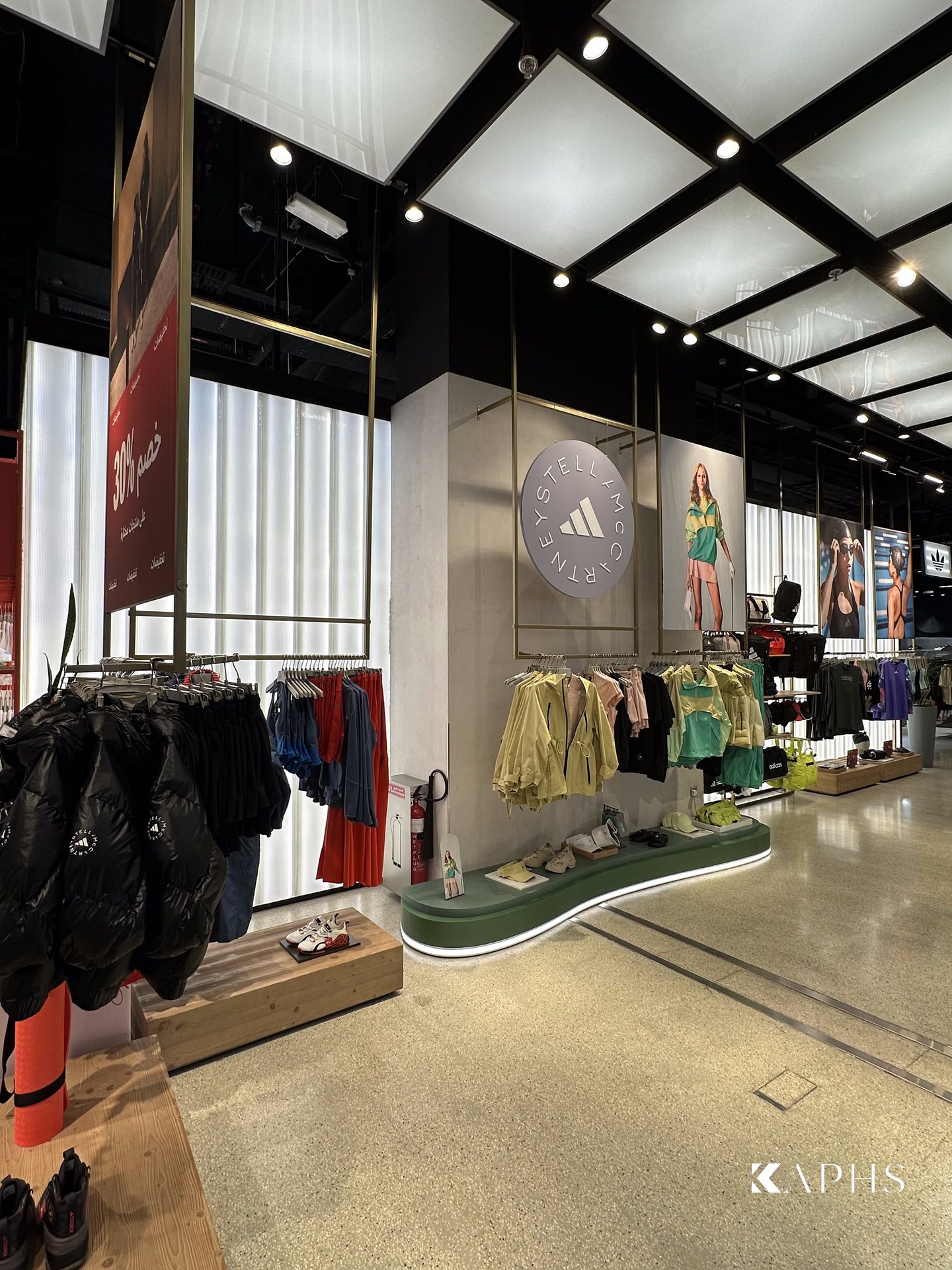 Channel glass feature wall on the shop floor, adidas Flagship Store Dubai Mall — KAPHS
