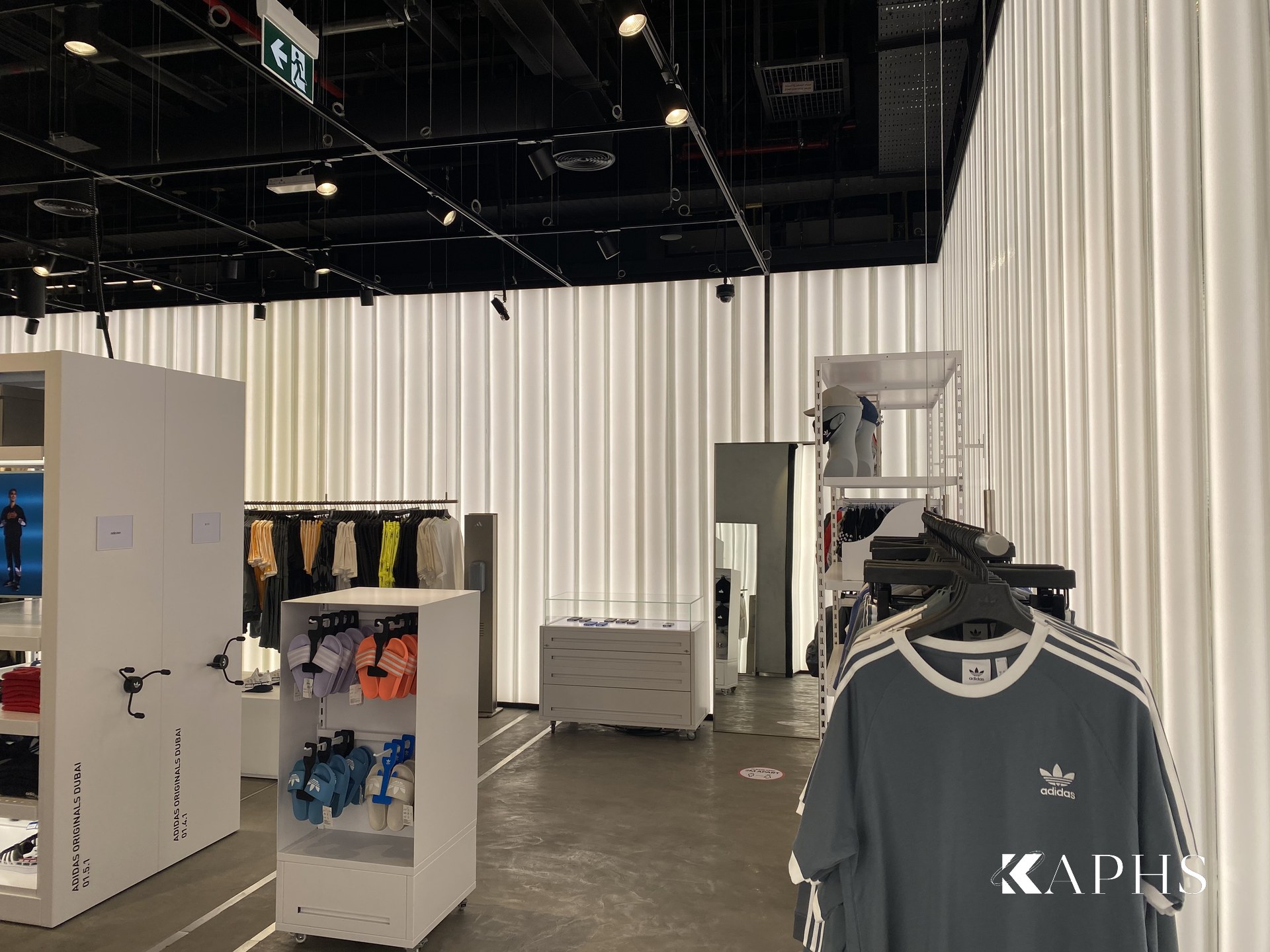 adidas Flagship Store Dubai Mall — backlit channel glass wall, KAPHS