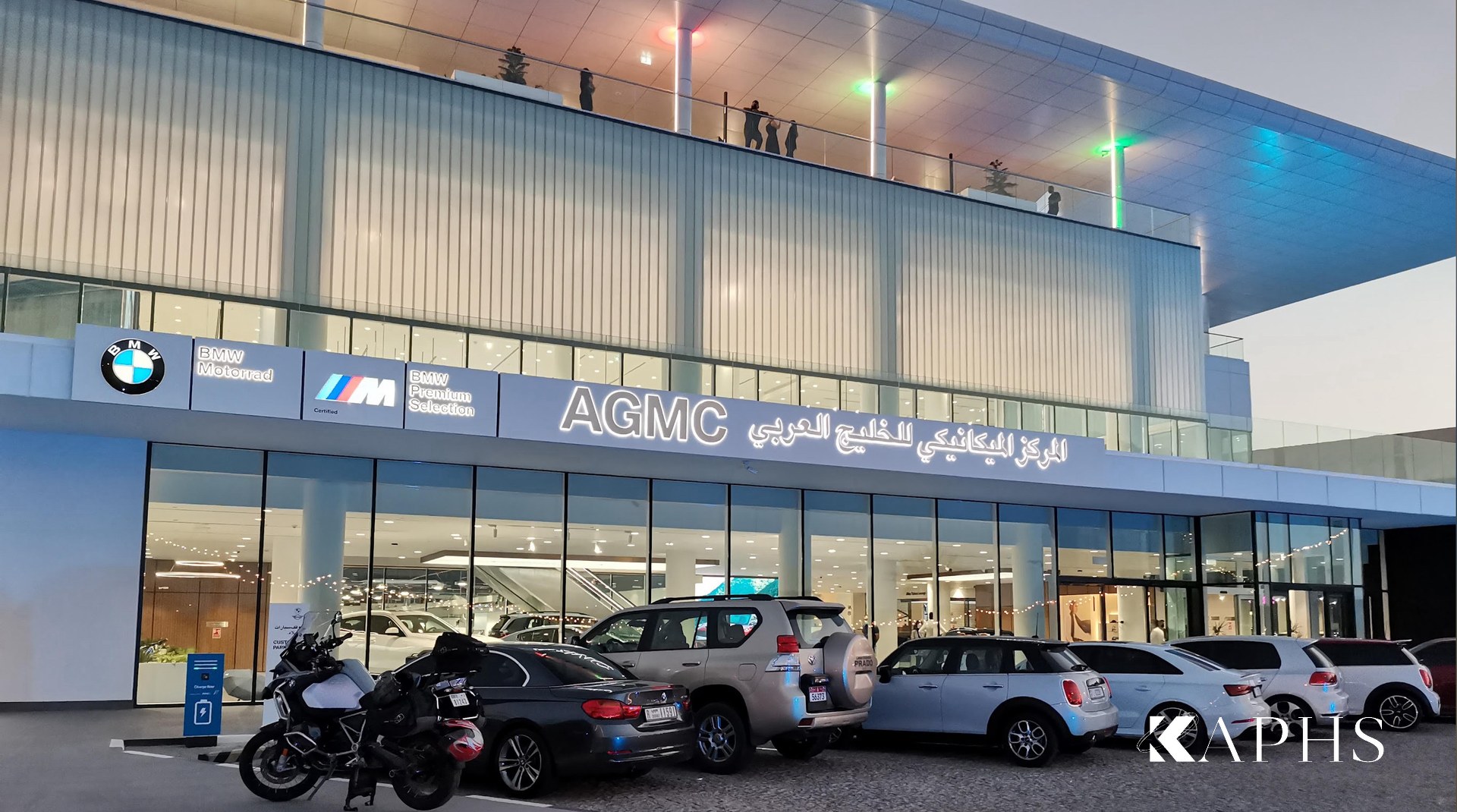 AGMC BMW showroom, Motor City Dubai — interior with LINIT U-channel glass daylight wall, KAPHS