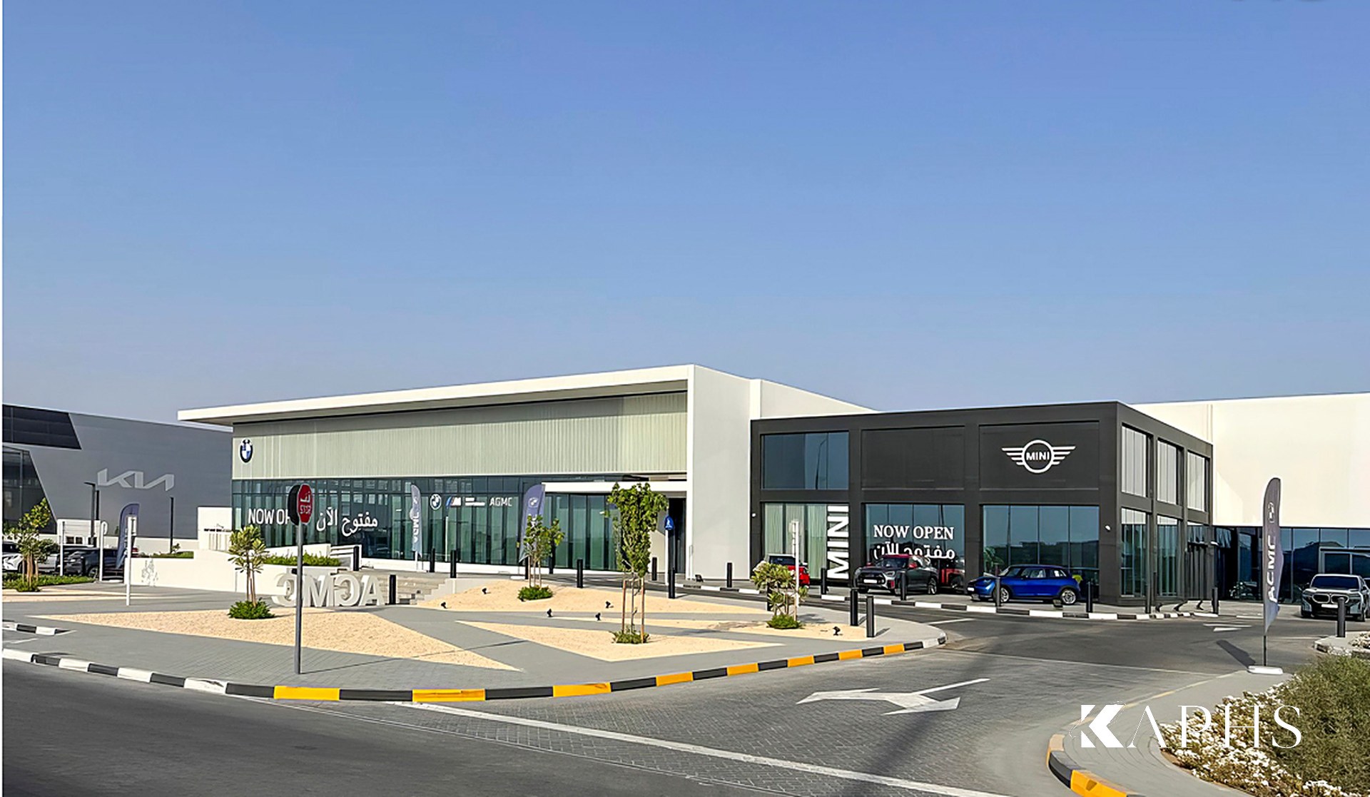 AGMC BMW & MINI showroom, Sharjah by day — LINIT U-channel glass façade, KAPHS (Dubai & UAE)