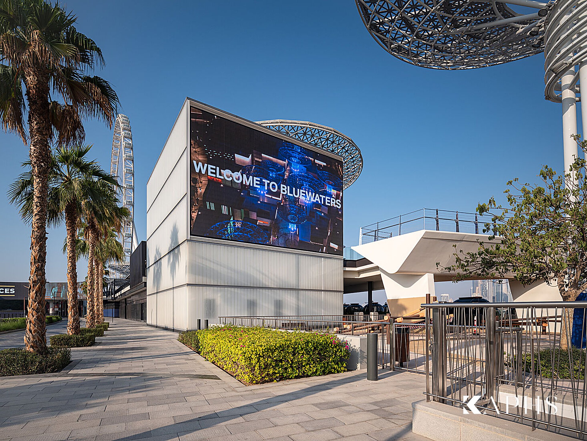 Bluewaters Island boardwalk with translucent U-channel glass wall, Dubai — KAPHS