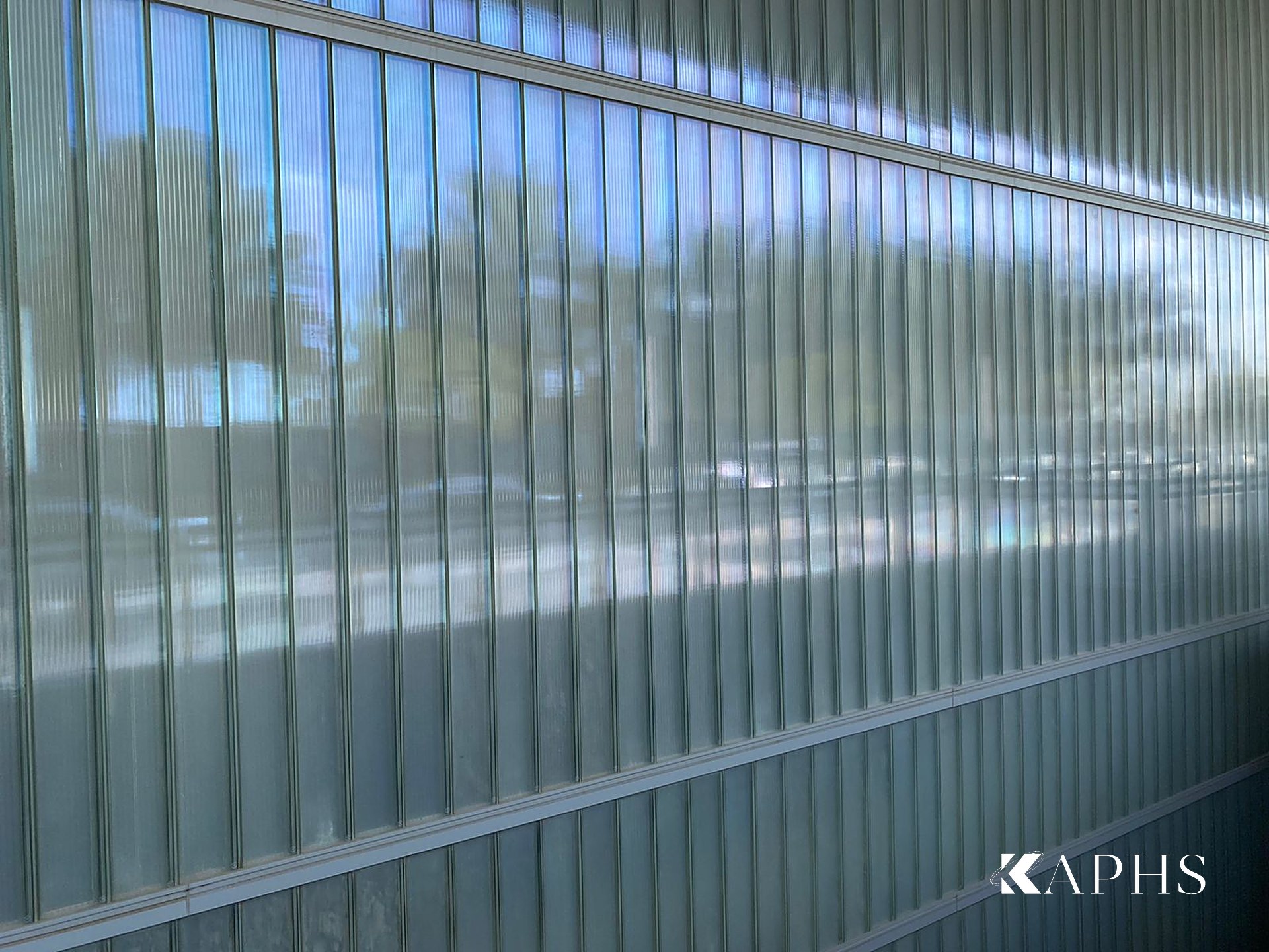 Close-up of the ribbed LINIT U-channel glass panels, Cleveland Clinic Abu Dhabi — KAPHS