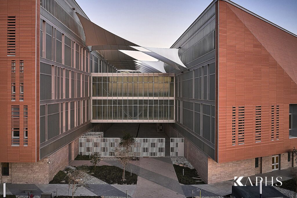 College of Engineering & Petroleum, Kuwait University — terracotta façade and glazed link bridge, KAPHS U-channel glass