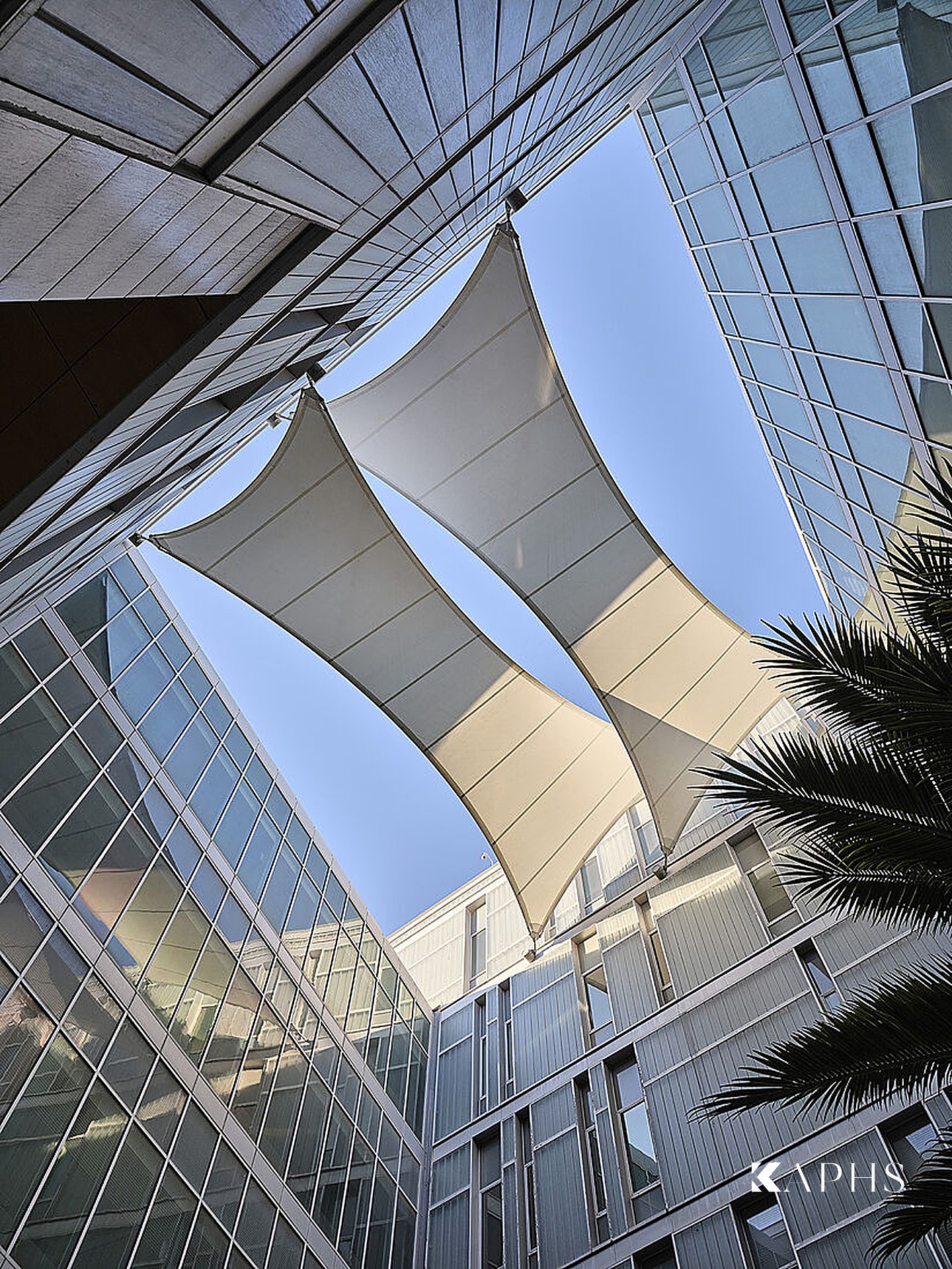 Atrium bridges and staircase at the College of Engineering & Petroleum, Kuwait — KAPHS channel glass