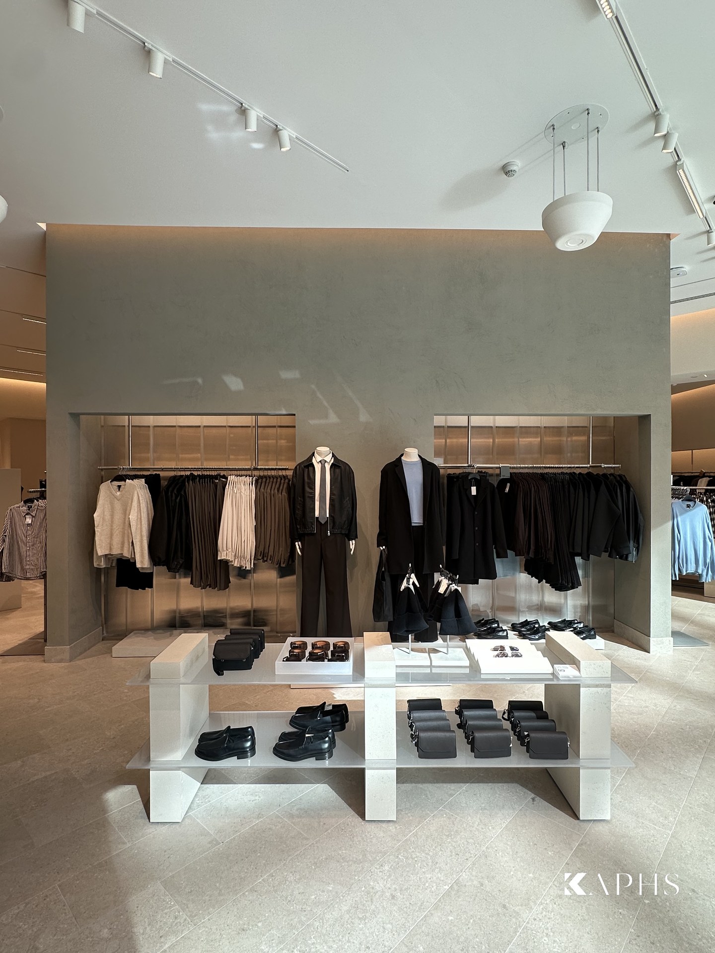LINIT U-channel glass partition dividing the H&M Yas Mall retail space — KAPHS