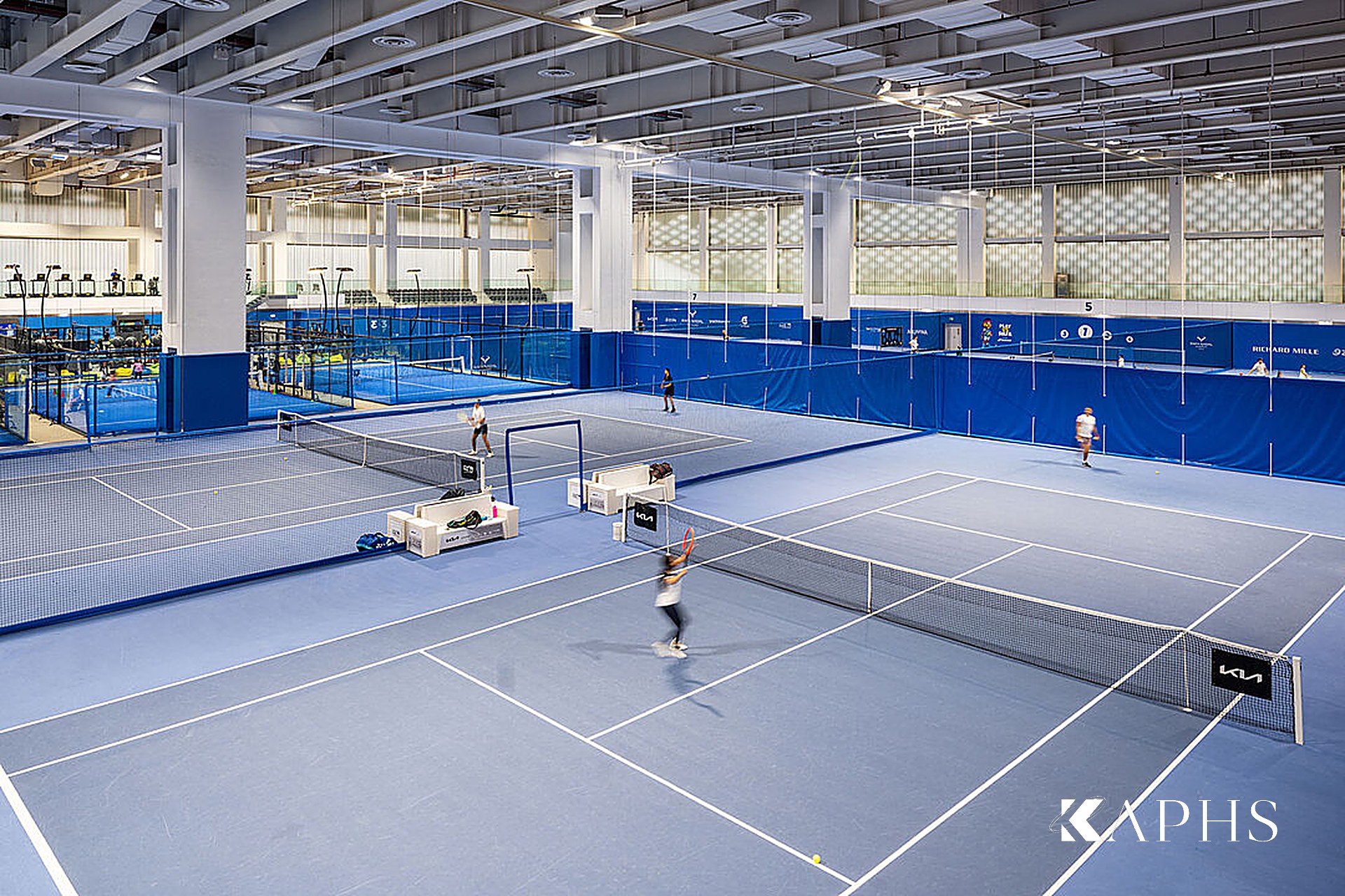 Indoor tennis courts and LINIT U-channel glass daylight wall, Kuwait International Tennis Complex — KAPHS